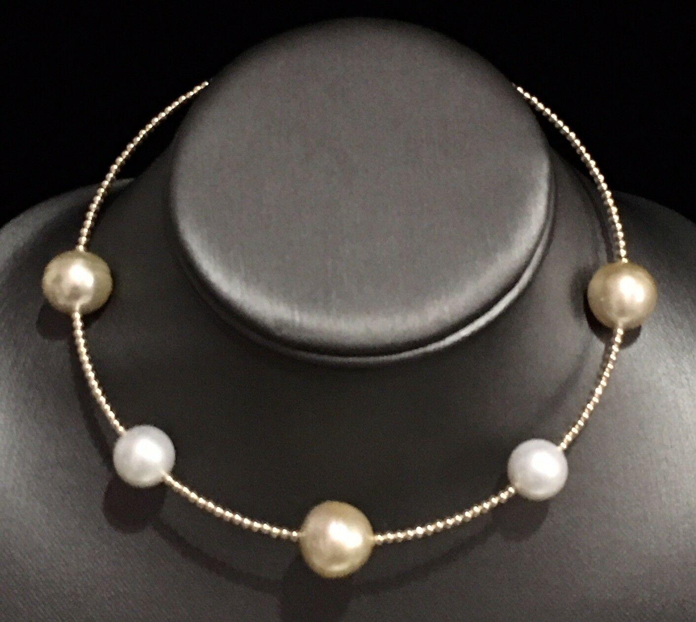 Fine Quality Golden South Sea Pearl Necklace 14k Gold 15.5 mm Italy Certified $2,490 820457

This is a Unique Custom Made Glamorous Piece of Jewelry!

Nothing says, “I Love you” more than Diamonds and Pearls!

This South Sea pearl necklace has been