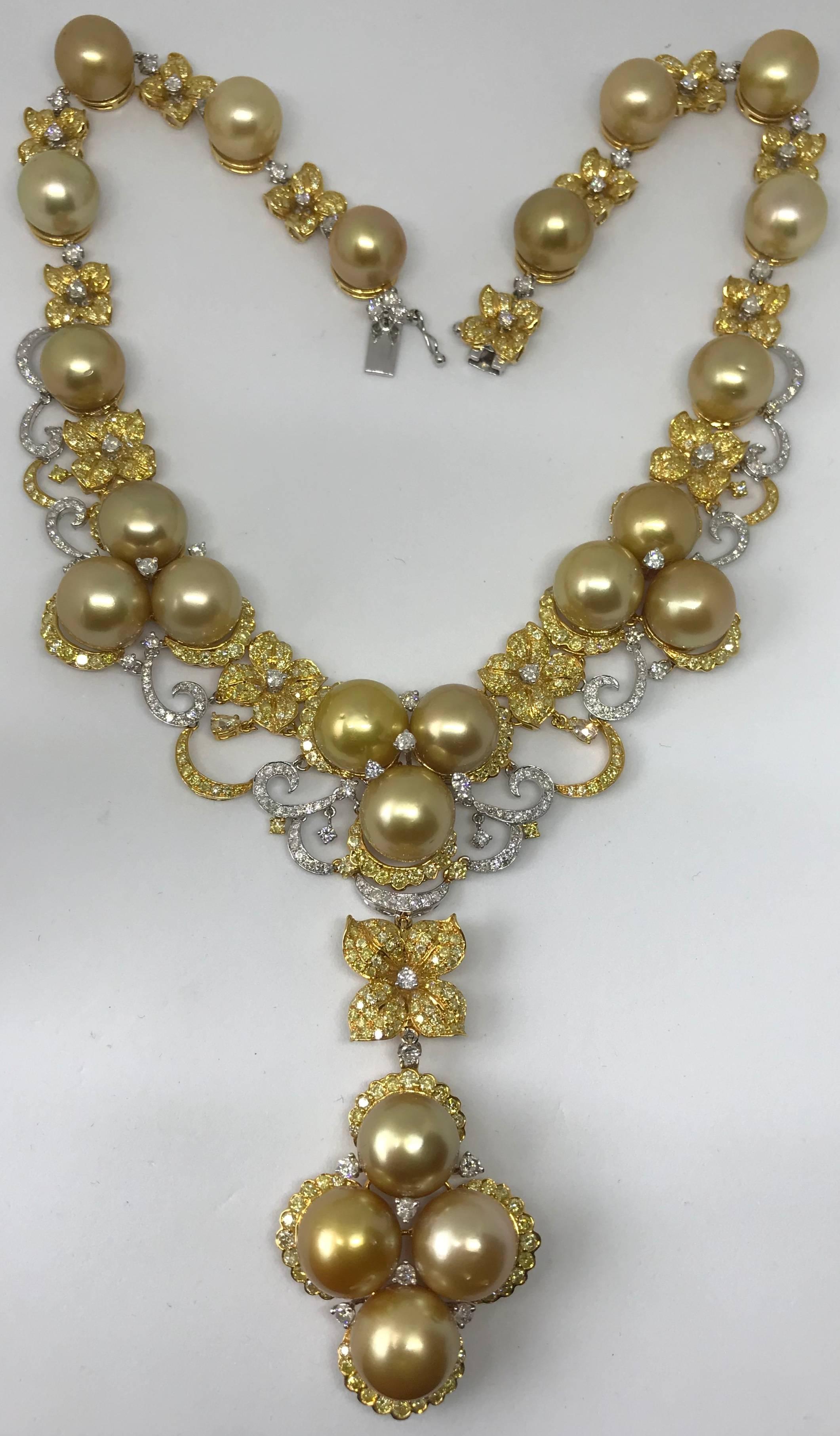 18k Multi color Gold Necklace set with finest no blemishes Golden South Sea Pearls.
Necklaces is set with:
1. Diamond Round VS FG -197 stones 5.13 Carat
2. Fancy Diamonds 701 stones 8.93 Carat 
3. Fancy Diamond 2 stones-- 0.31 carat
4. Golden South