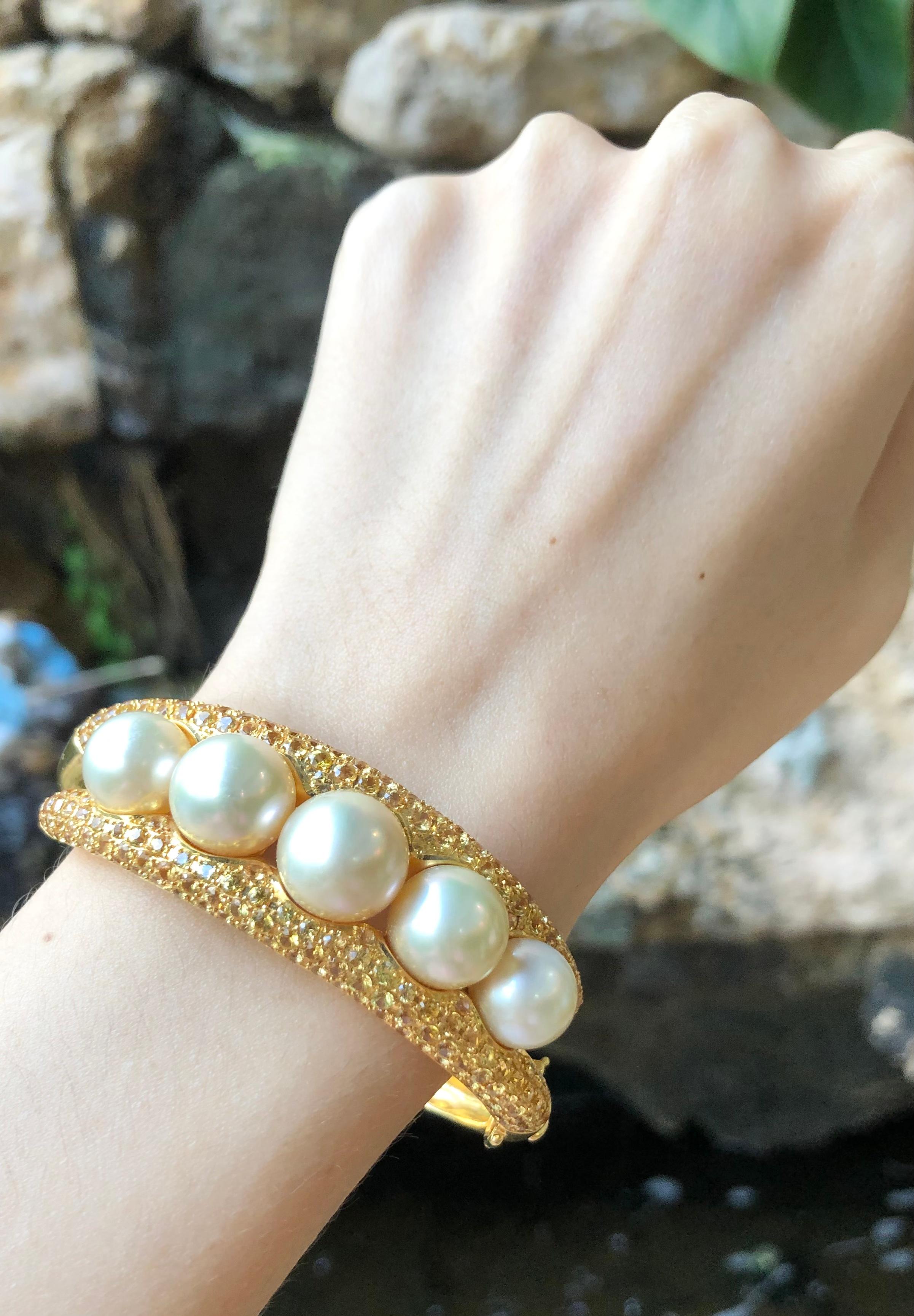 Mixed Cut Golden South Sea Pearl with Yellow Sapphire Bangle set in 18 Karat Gold For Sale