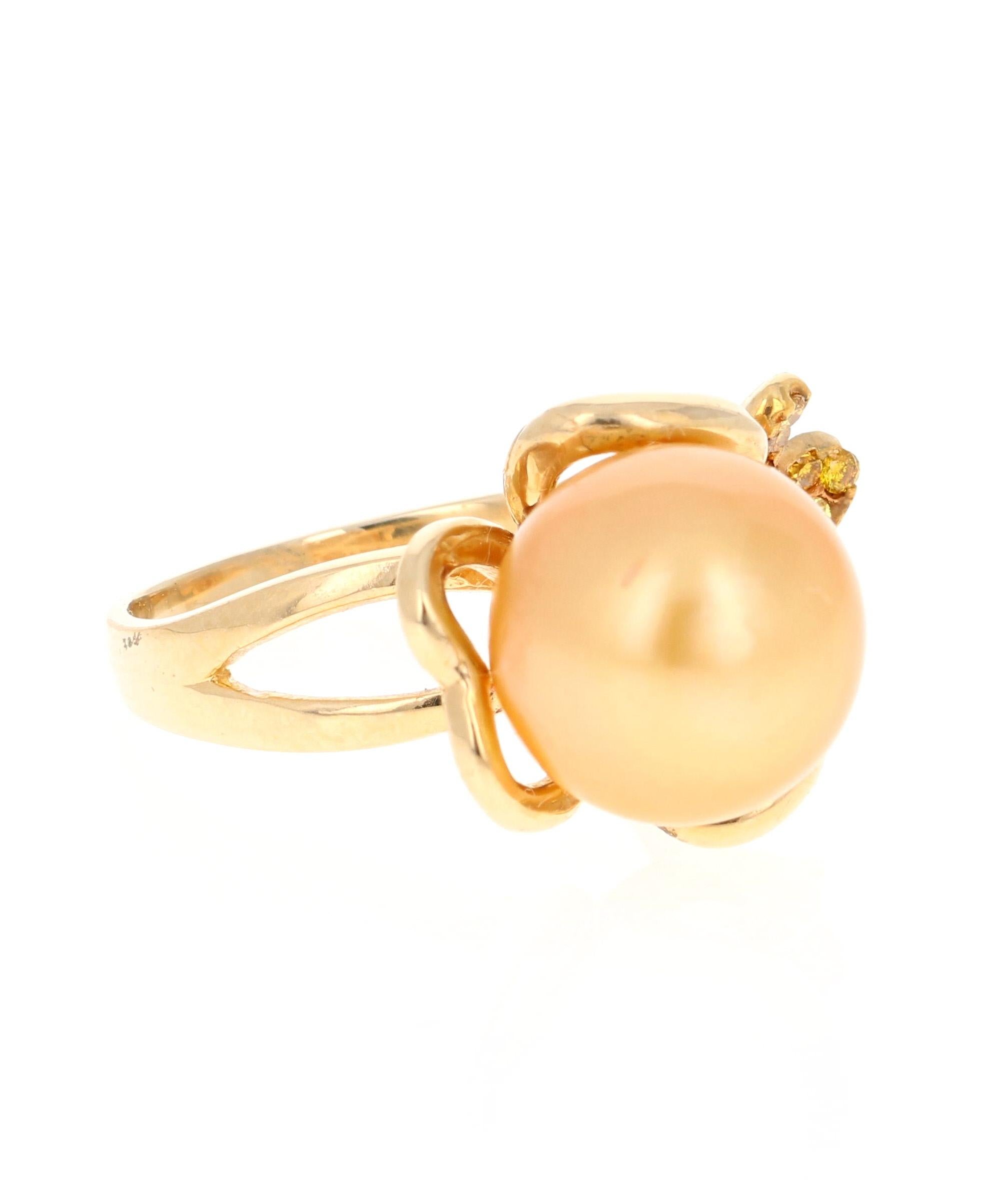 This one of a kind South Sea Pearl Ring will surely stand out in a crowd. It has a 9 mm Golden South Sea Pearl with 18 Round Cut Yellow Diamonds on the petals weighing 0.20 Carats. The yellow diamonds are natural and a fancy yellow color with the