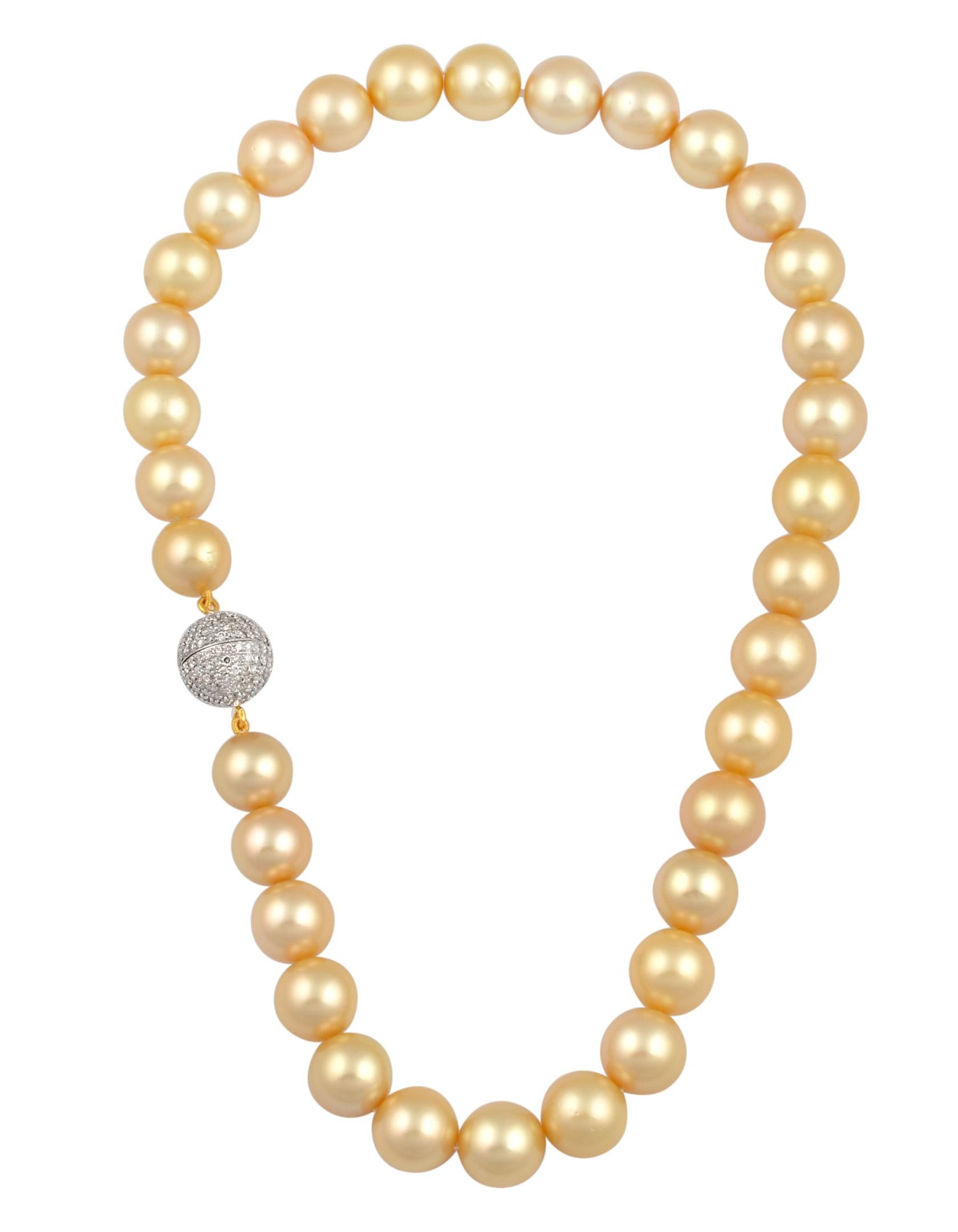 13-15 mm Golden South Sea Pearls  no blemishes ,18  Inches Long Strand Necklace , Estate
Exclusive , Very fine  quality,  you can see any  blemishes on them
The necklace is composed of  33 Golden south Sea Pearls and one 14Karat white gold studded