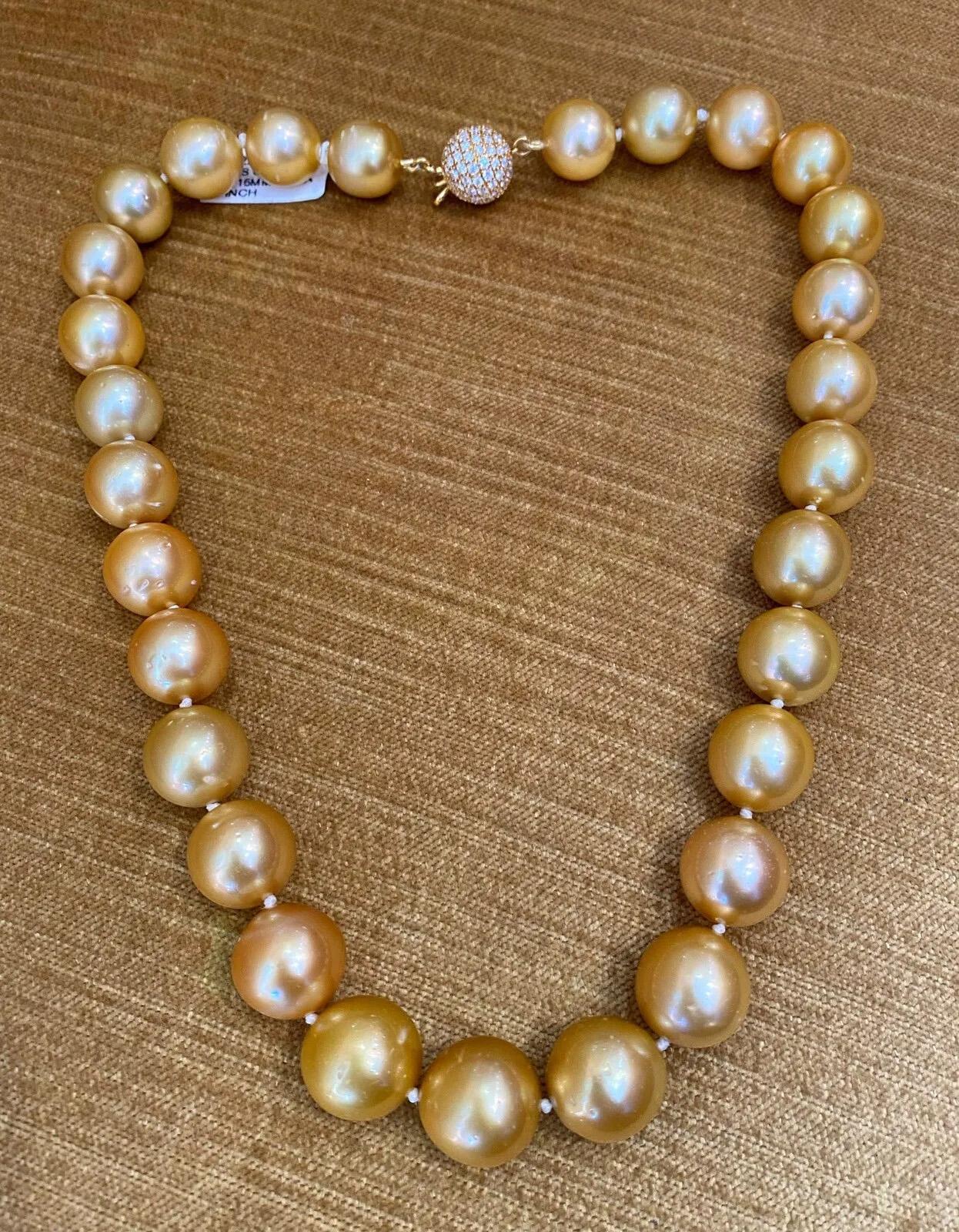 Golden South Sea Pearls & Diamond Necklace in 18k Yellow Gold

Golden South Sea Pearls and Diamond Necklace features 29 Golden South Sea Pearls and one Pavè Diamond Ball Clasp with Round Brilliant cut Diamond covering the entire clasp in 18k Yellow