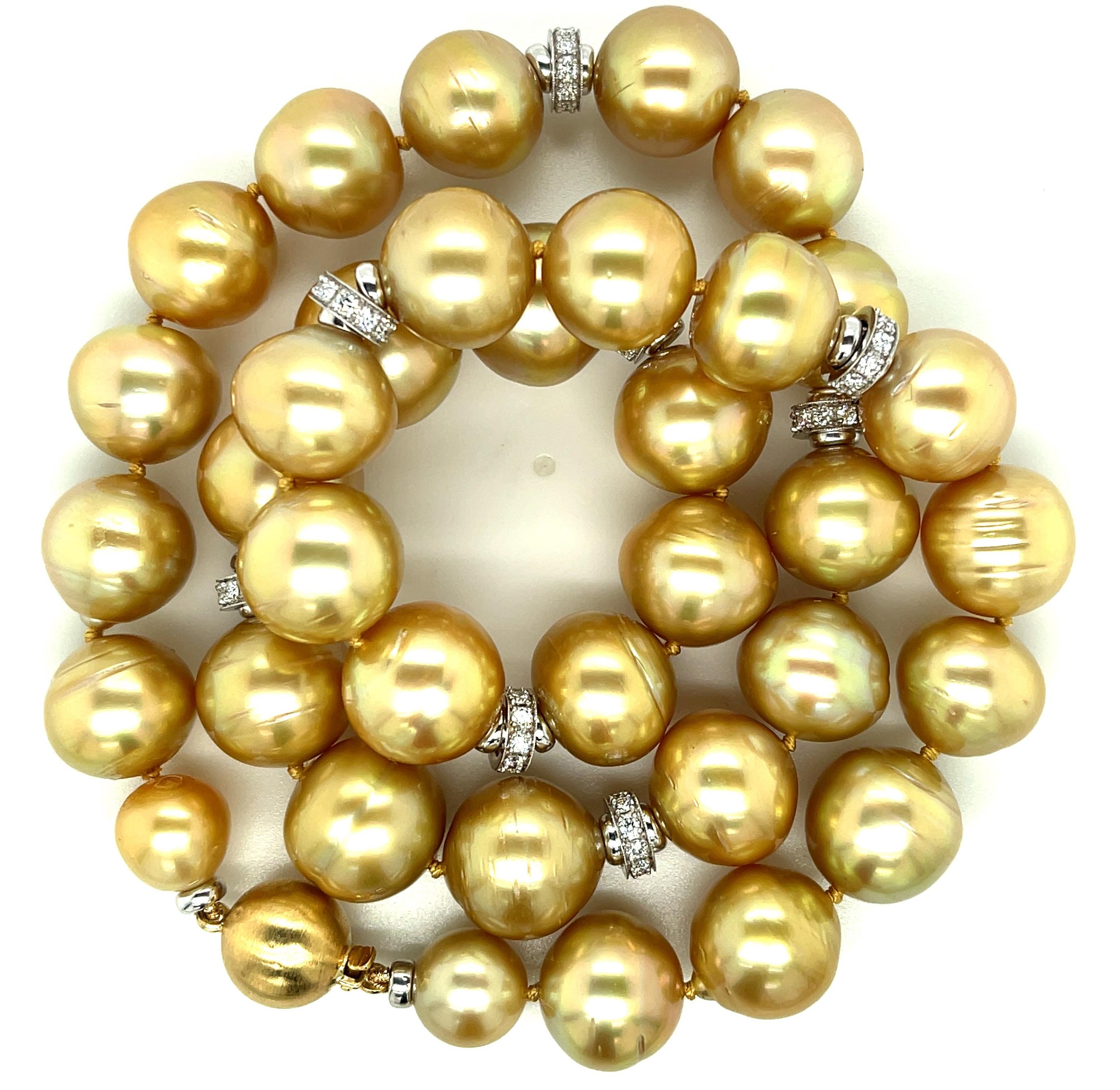 This exquisite strand of semi-baroque, roundish golden South Seas pearls is absolutely stunning!  Included are 35 gorgeous pearls graduating in diameter from 10.00mm to 15.00mm, all with superior luster. They have been hand strung on golden silk