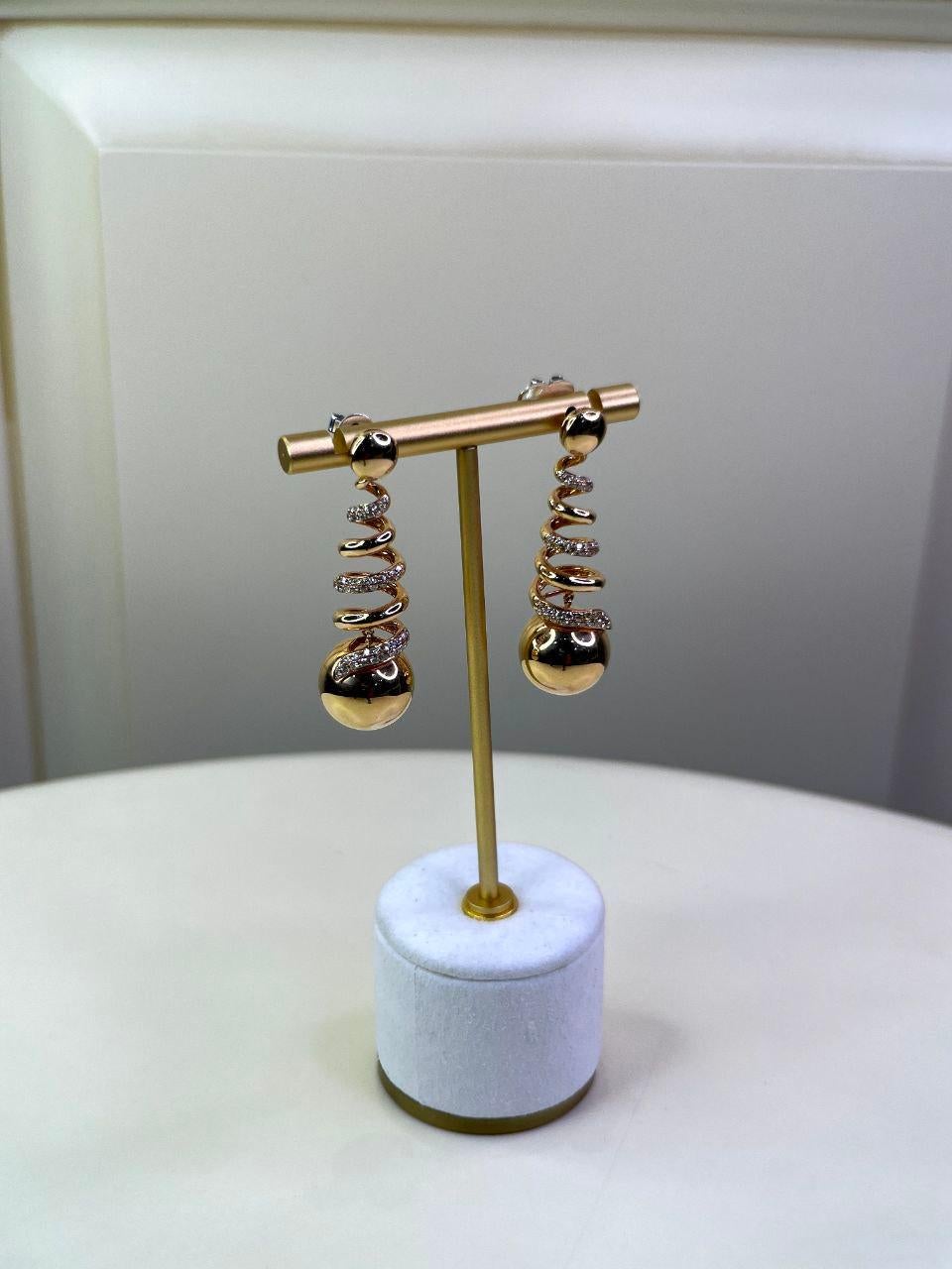 globe earrings gold