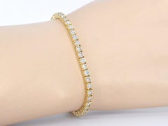 Golden Tennis Bracelet with 6.50 Carat Diamonds