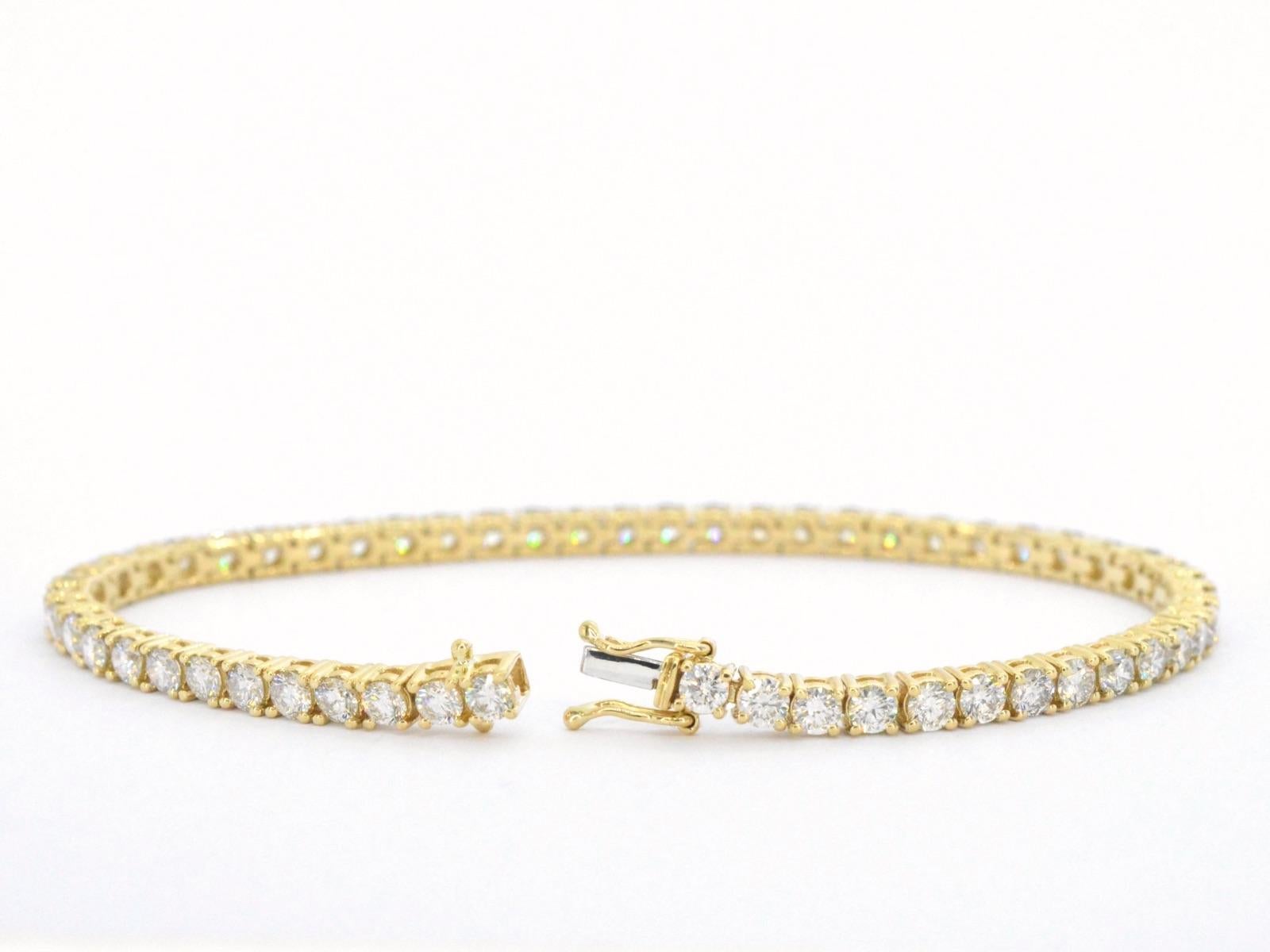 Brilliant Cut Golden Tennis Bracelet with 6.50 Carat Diamonds For Sale