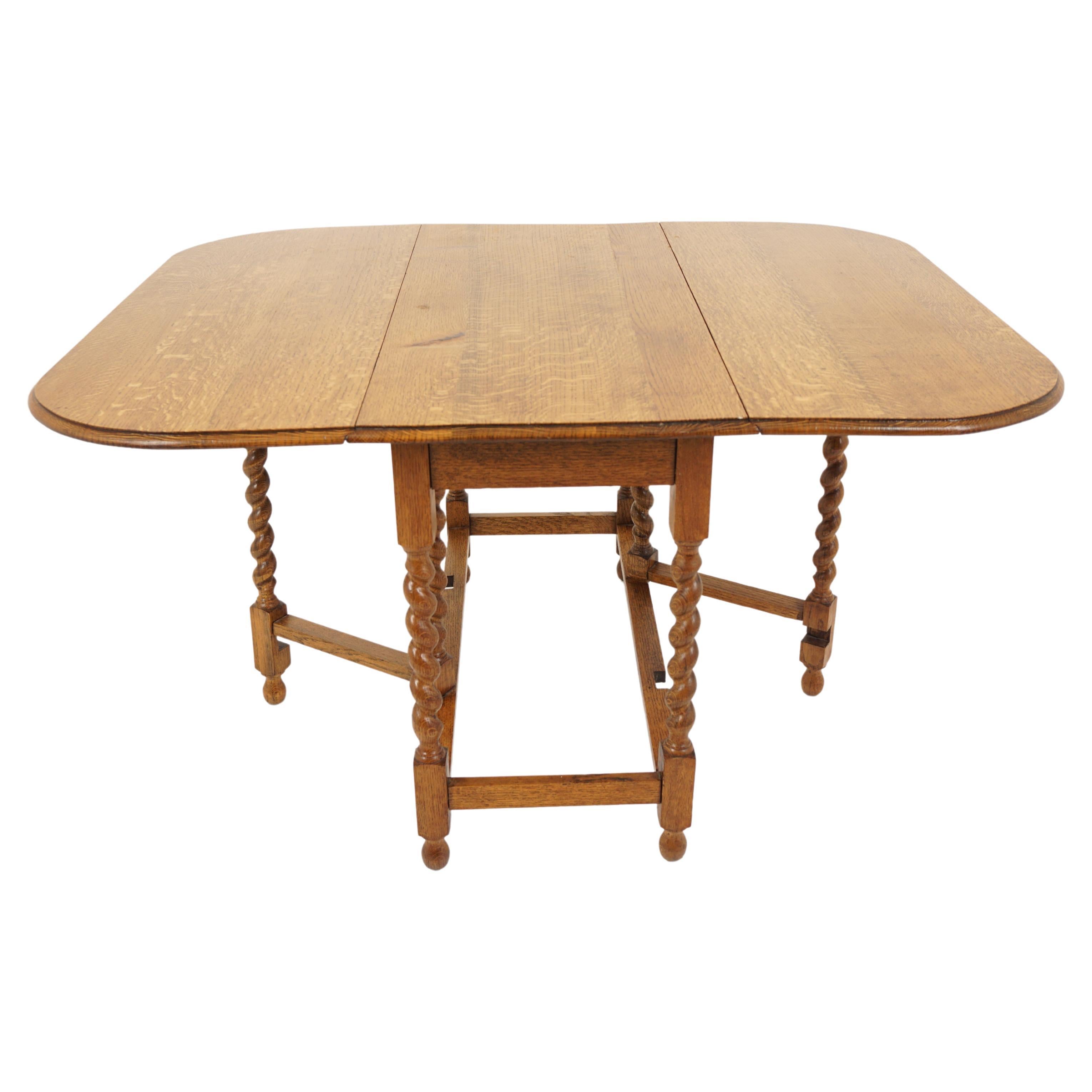 Golden tiger oak Barley Twist Gateleg, drop leaf table dining table, Scotland 1920, B2934

Scotland 1920
Solid Oak
Original Finish
Rectangular moulded top
Pair of rounded leaves on the sides
All standing on eight barley twist legs
Connected
