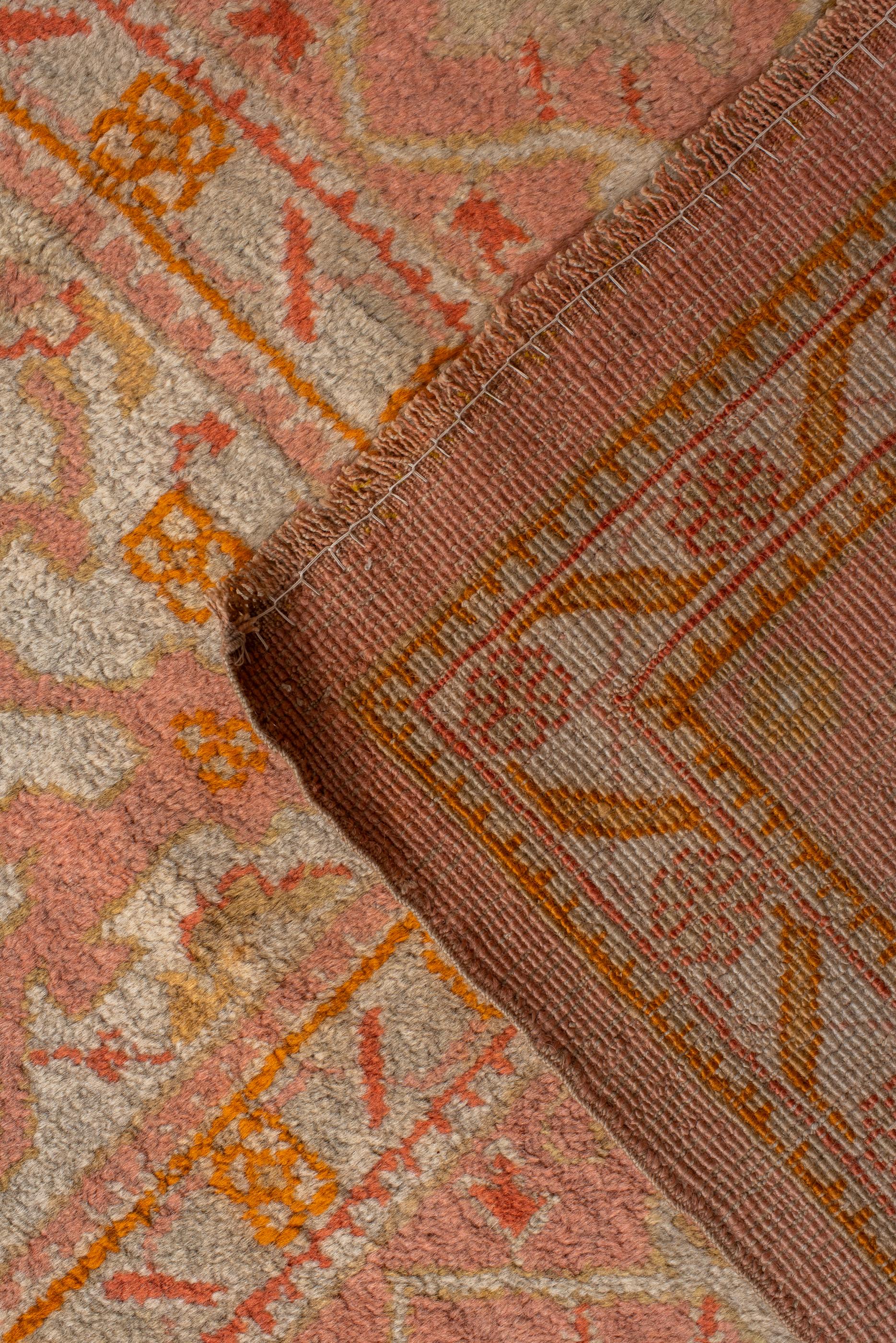 Wool Golden Toned Antique Oushak, Circa Early 20th Century For Sale