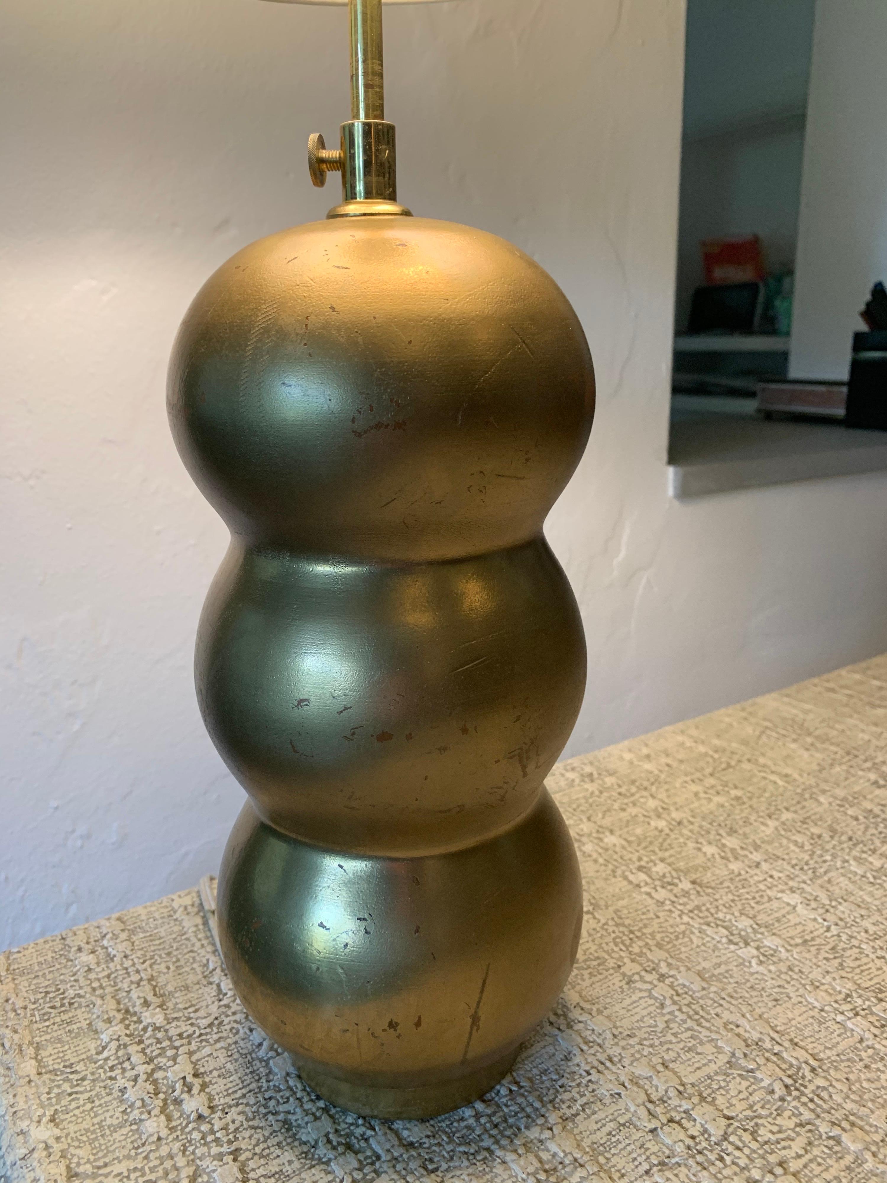 Gold gilded one solid turned wood lamp base. All original sockets and hardware, custom shade.

Note: The shade is normally not included in our lamp offerings. However, if you like this shade, it will be included at no additional cost. This shade