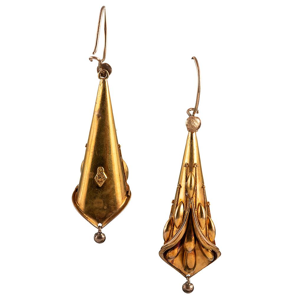 Exquisite antique treasures rendered in 15 karat yellow gold and styled of golden calla lilies, these earrings are an exceptional example of the skilled craftsmanship of Victorian jewelers. Note the beautiful patina achieved from over a century of