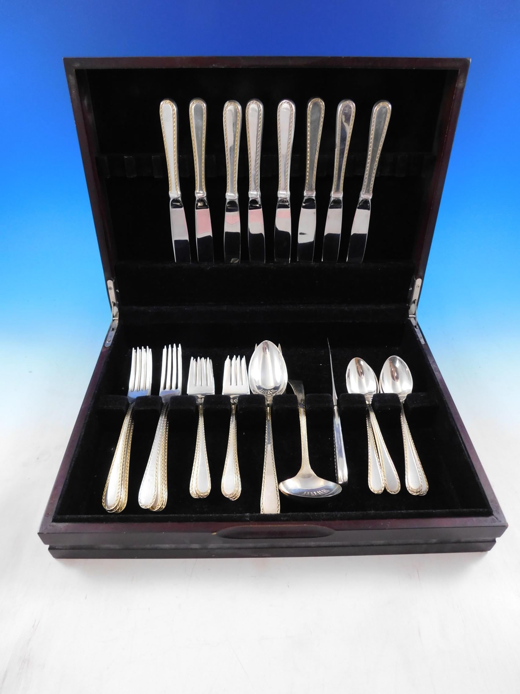Unique among sterling patterns, Winslow harmoniously combines an unadorned center of sterling silver with an accent design along the border of each piece. Inspired by a pattern made over a century ago the brilliance of the bright cut GOLD-ACCENT