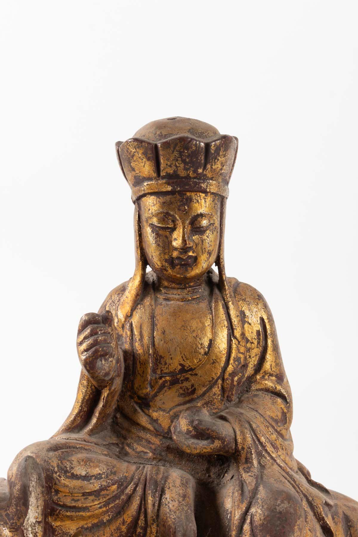 Chinese Export Golden Wooden Buddhist Deity, Seated on a Lion, China, Late 19th Century