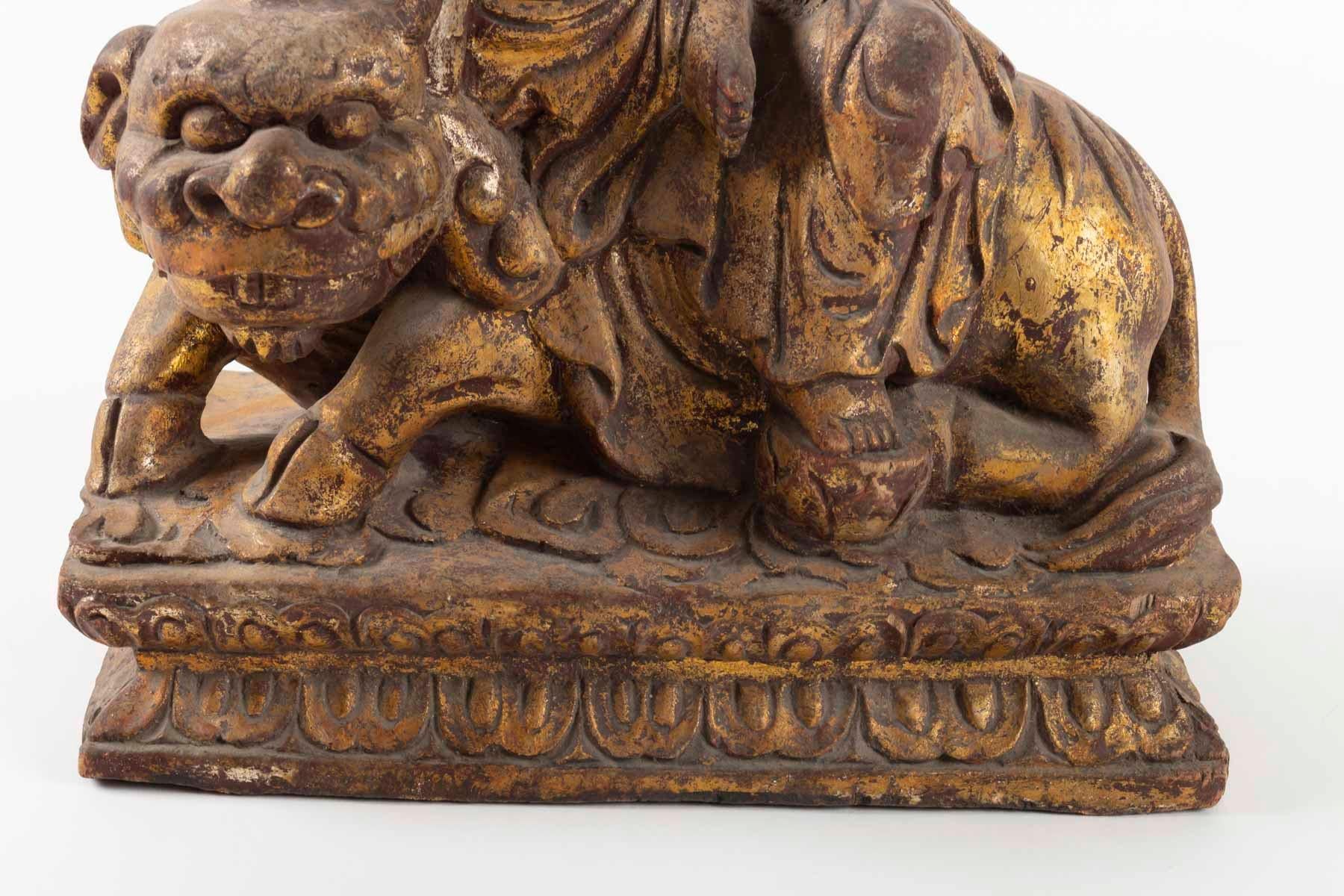 Chinese Golden Wooden Buddhist Deity, Seated on a Lion, China, Late 19th Century