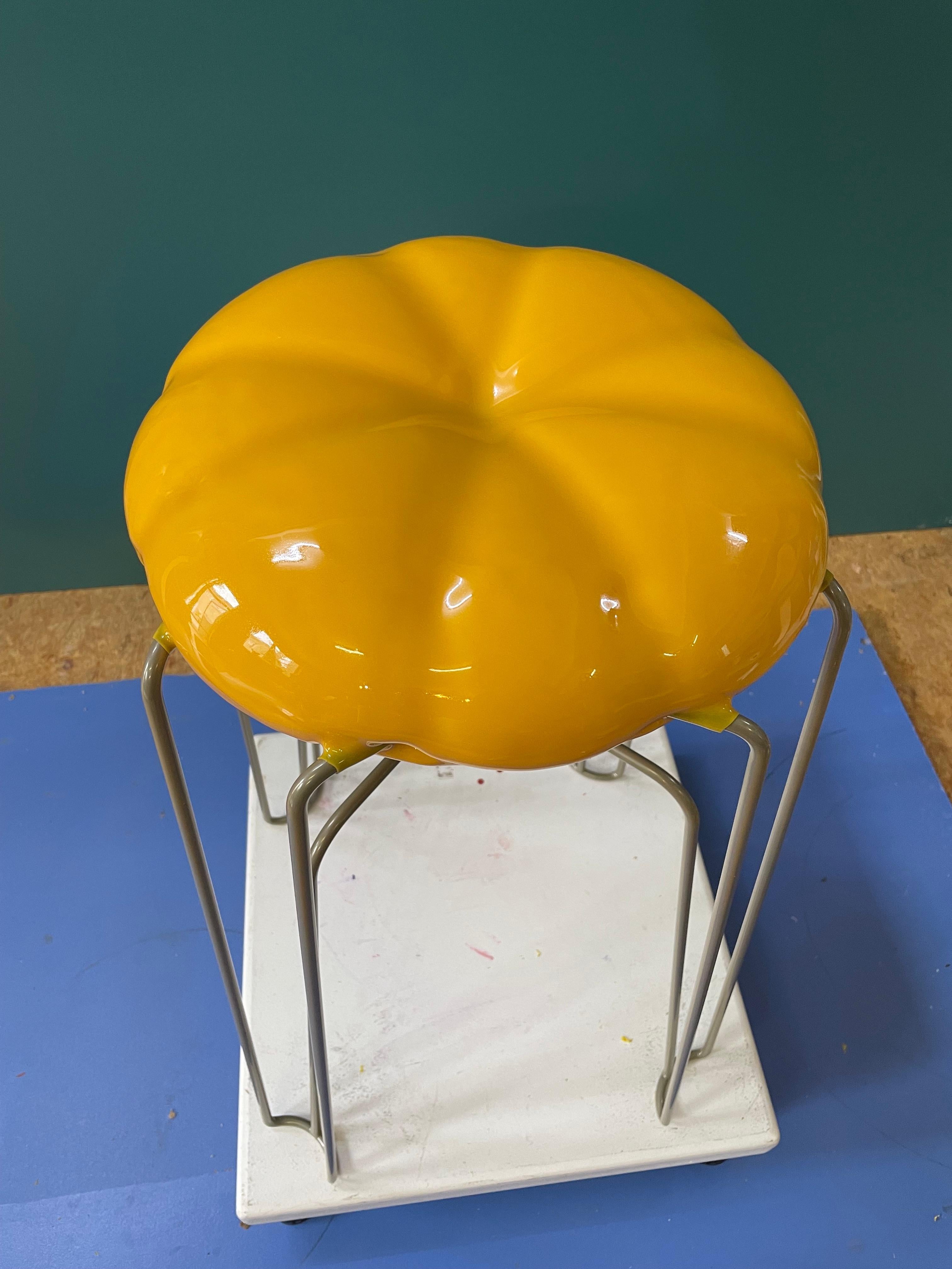 soft yellow stool