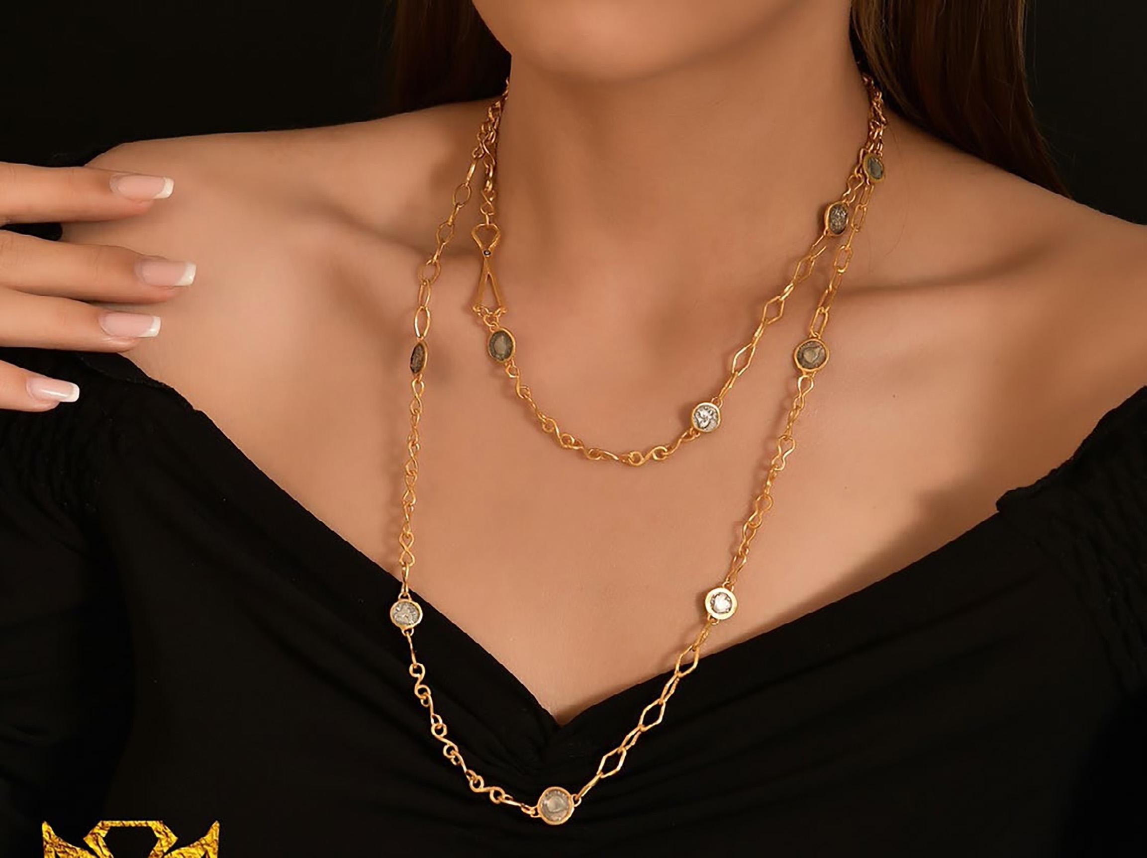 Goldenhorn Necklace with Coins, 43“, by Kurtulan Jewellery of Istanbul, Turkey, 0.03ct diamonds. This necklace is made to order by Kurtulan in Istanbul, Turkey.  Delivery takes approximately 4-6 weeks.

About Kurtulan:
A jewellery manufacturing