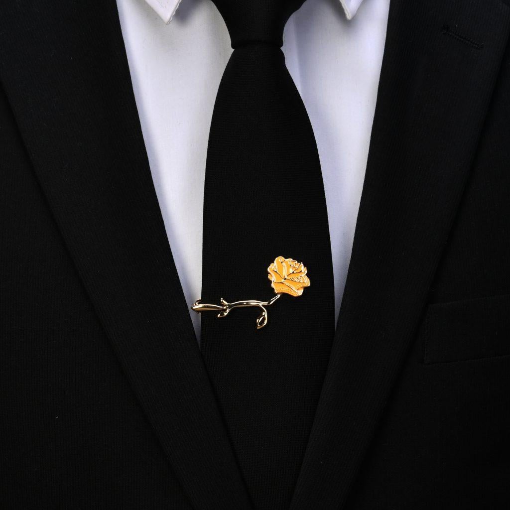 In a rich golden hue, our Goldenrod Gift Eternal Tie Clip is a ray of sunshine to everyone who lays eyes on it. Adorned in gold and hand-crafted to perfection, this elegantly painted floral tie clip is sure to bring joy to your loved ones. A dear