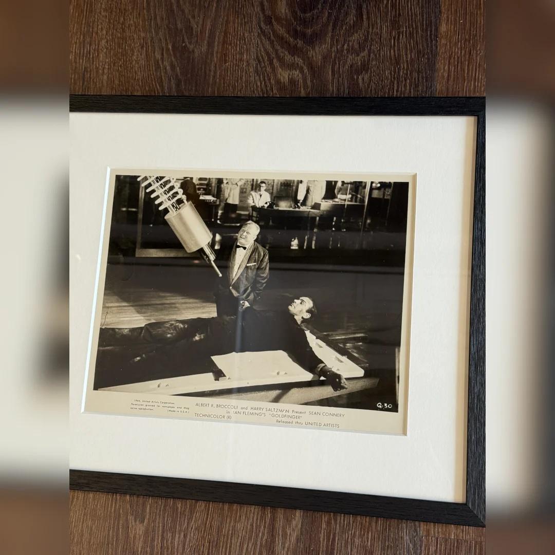 Goldfinger (1964) - FRAMED
Photo Still (8 X 10 Inches)

Original Vintage Theatrical Still #G-30.

Connery & Frobe in 'No Mr. Bond, I expect you to die' scene! That’s the classic exchange between British Secret Service agent James Bond and