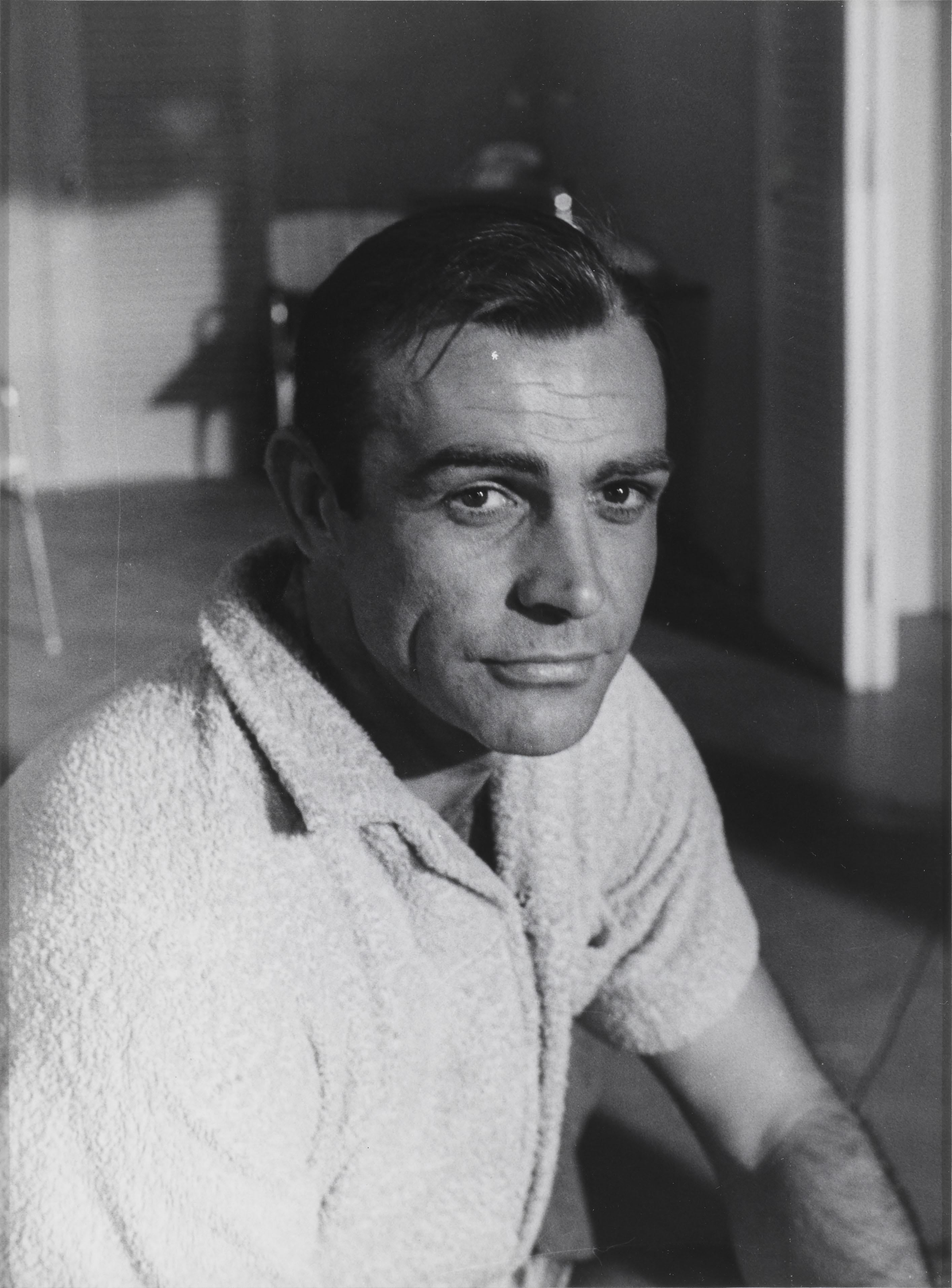 Original US photographic production still from James Bond's Goldfinger 1964. This was the 3rd James Bond film and the 3rd time Sean Connery played 007. This piece is conservation framed in a Sapele wood frame with acid free card mounts and UV