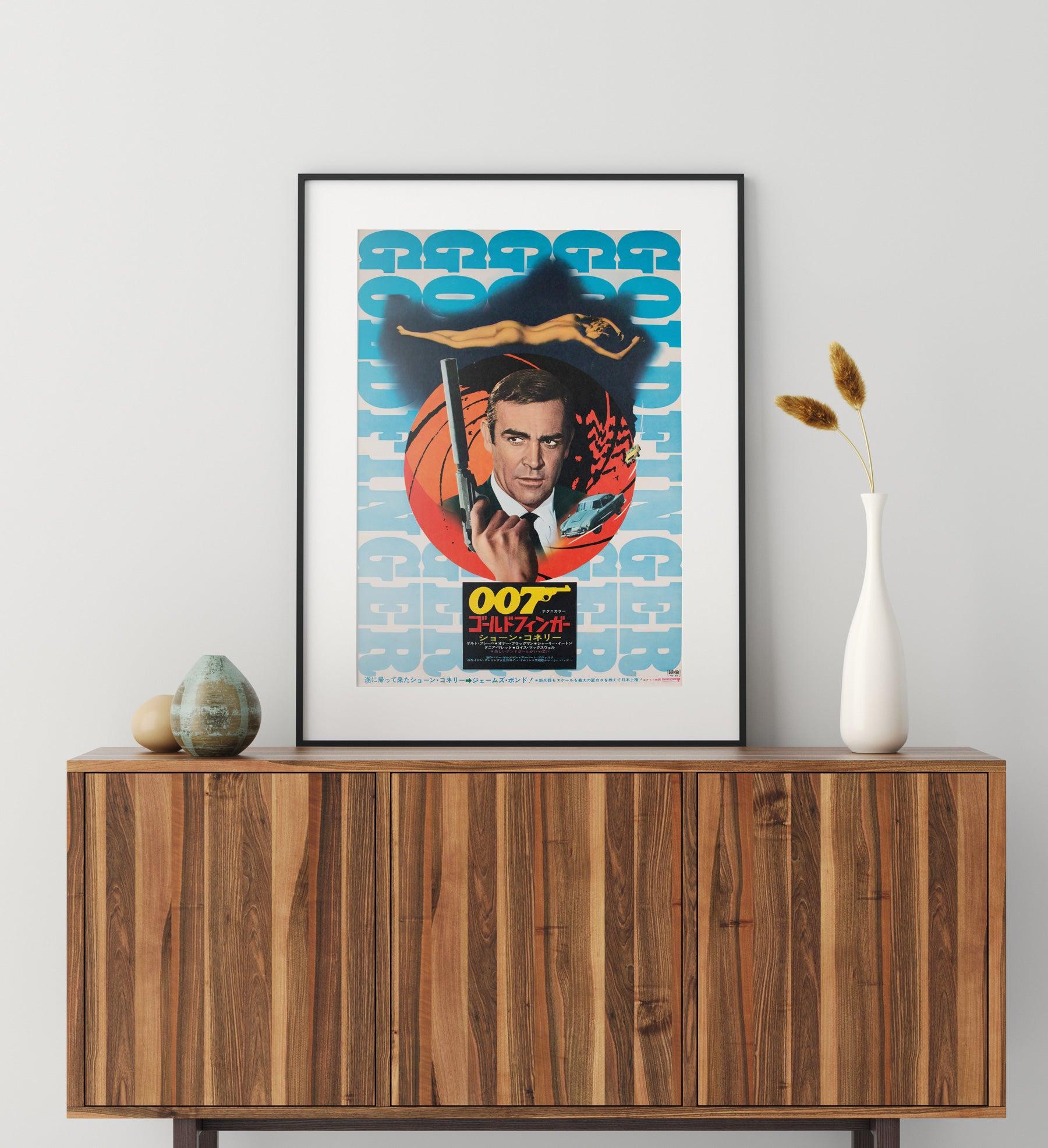 We love the alternative artwork that features on the 1971 re-release Japanese film poster for James Bond classic Goldfinger.

This original movie poster is sized 20 1/4 x 28 1/2 inches. It will be sent rolled (unframed).