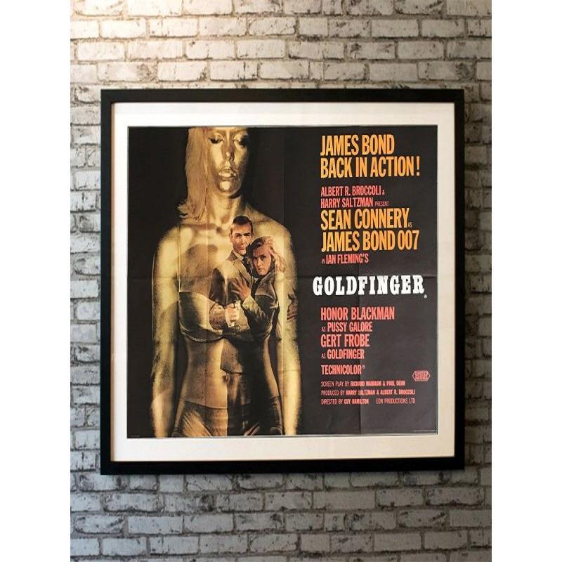 Goldfinger, Unframed Poster, 1964

Original British Quad (30 X 40 Inches). This iconic poster by designer Robert Brownjohn - with the image of Shirley Eaton covered in gold paint, together with Sean Connery and Honor Blackman in the foreground -
