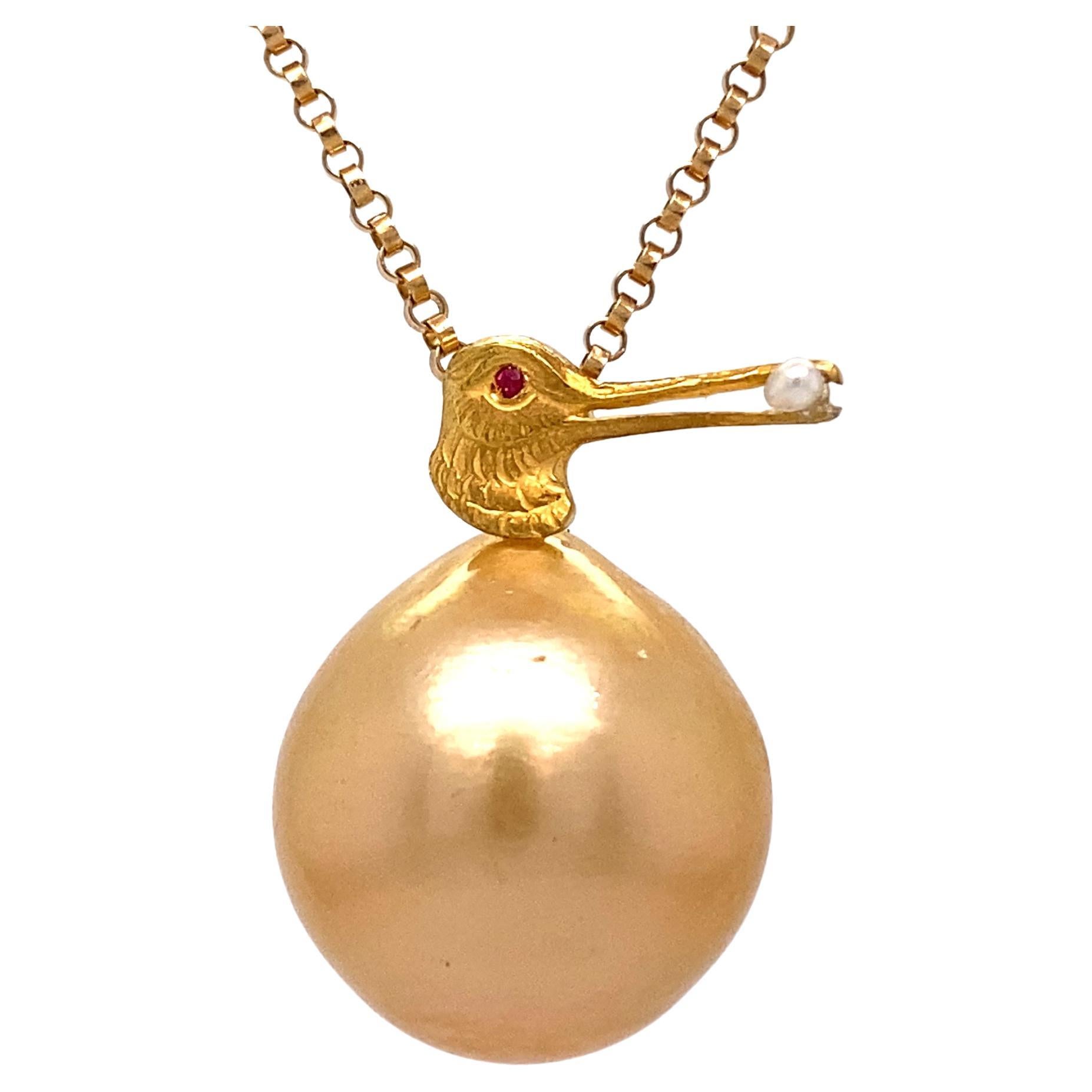 "Goldie" South Sea Pearl Pendant with Ruby-Eyed Shorebird on Chain For Sale