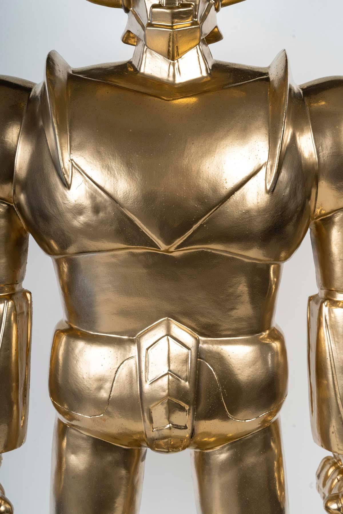 French Goldorak Sculpture in Painted Resin, Gold Colour, 20th Century, Modern Art.