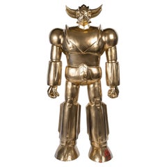 Goldorak Sculpture in Painted Resin, Gold Colour, 20th Century, Modern Art.