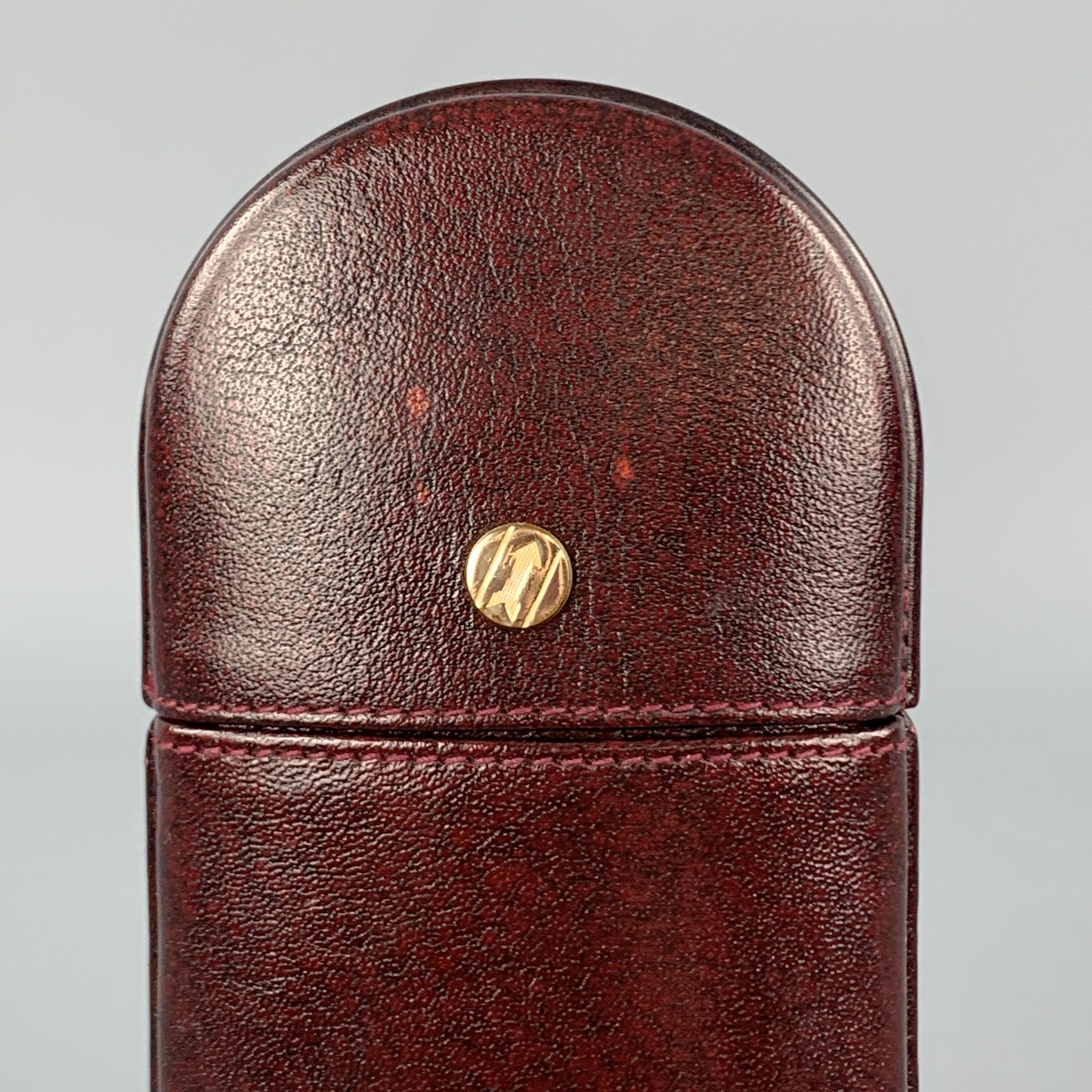 GOLDPFEIL sunglasses case comes in burgundy leather with a pop off top. 

Very Good Pre-Owned Condition.

Size: 6.5 x 3 in.
Width: 1 in.