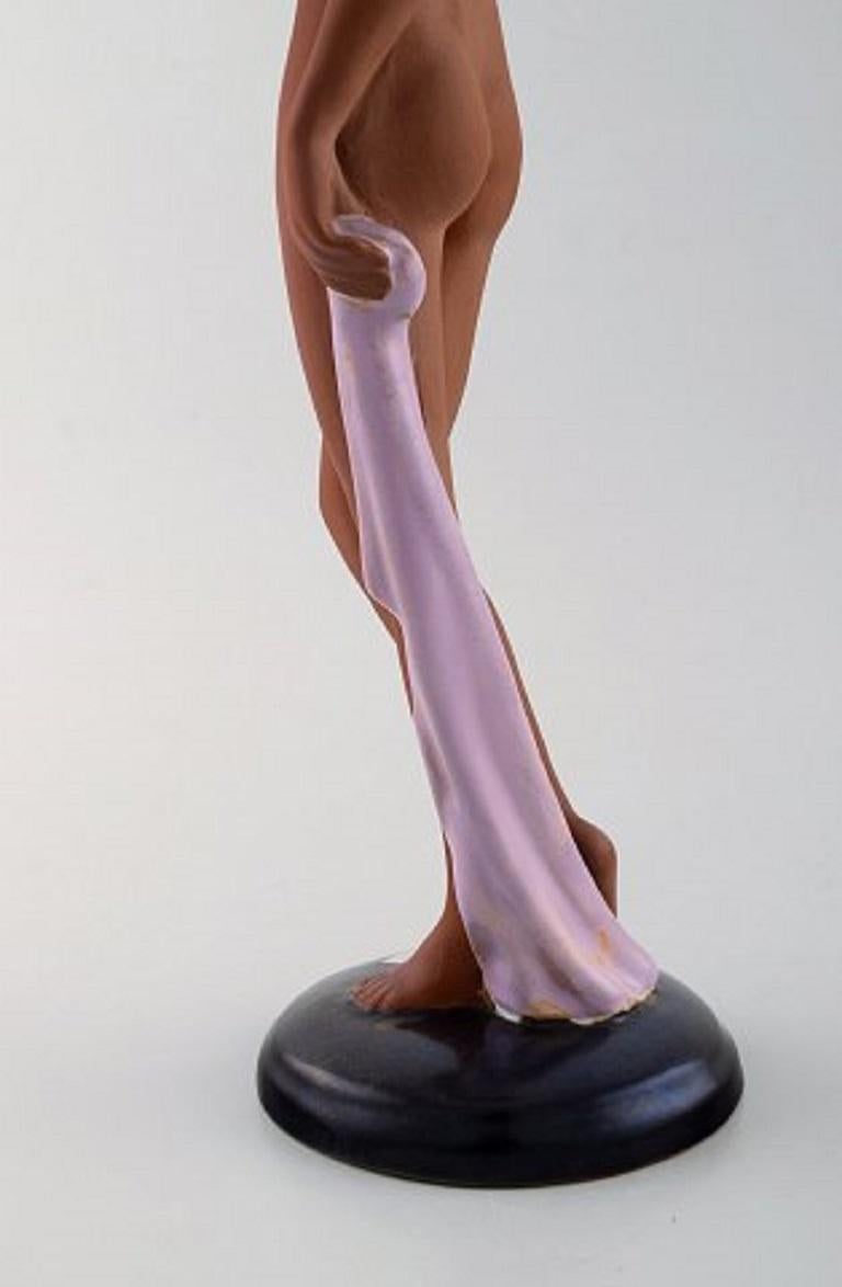 German Goldscheider Art Deco Figure of Nude Woman in Partially Glazed Red Clay For Sale