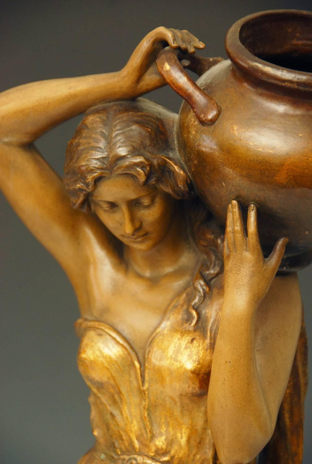 Beautiful Art Nouveau terracotta figure of the water carrier by Ferdinand Grohs.
Signed and numbered, very good condition, two small nicks on back of right arm.

Price includes free delivery to anywhere in the world.
  