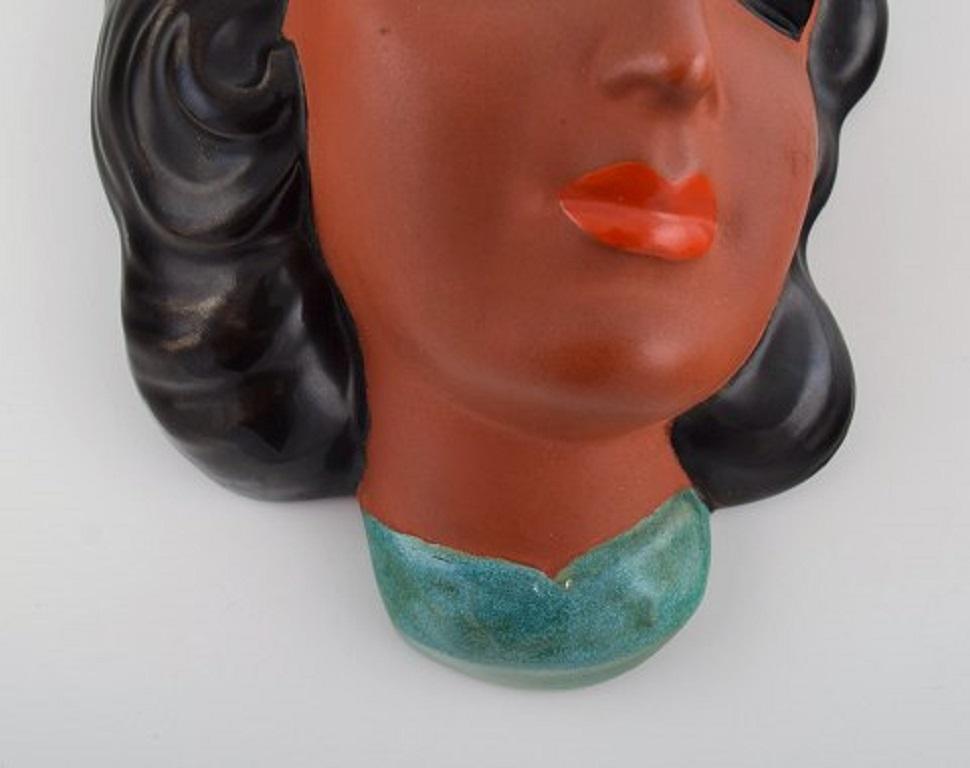 German Goldscheider, Austria, Art Deco Female Face in Hand Painted Glazed Ceramics For Sale