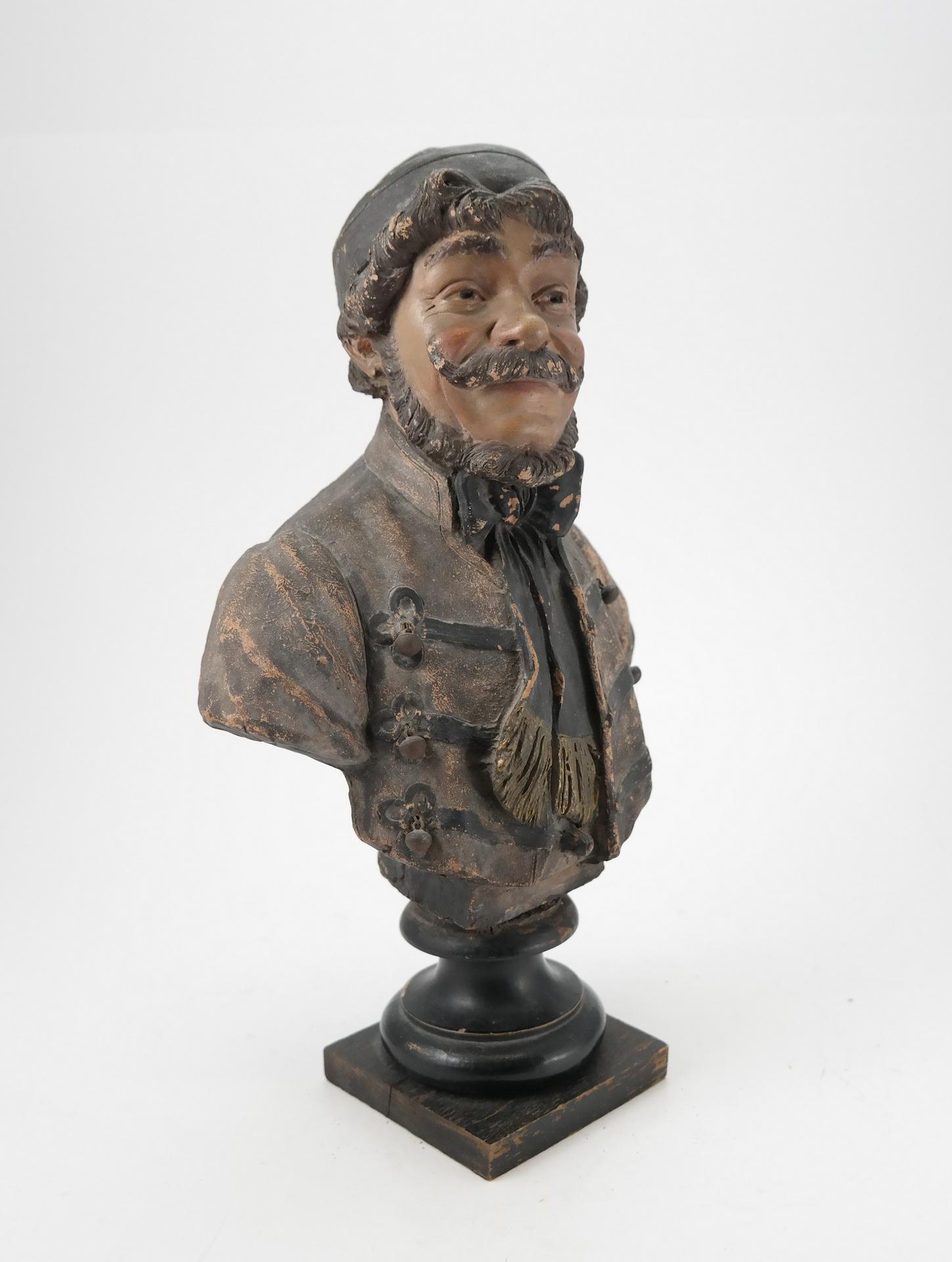 This fine antique bust portrays a beautiful moustached man - signed, stamped on the back 