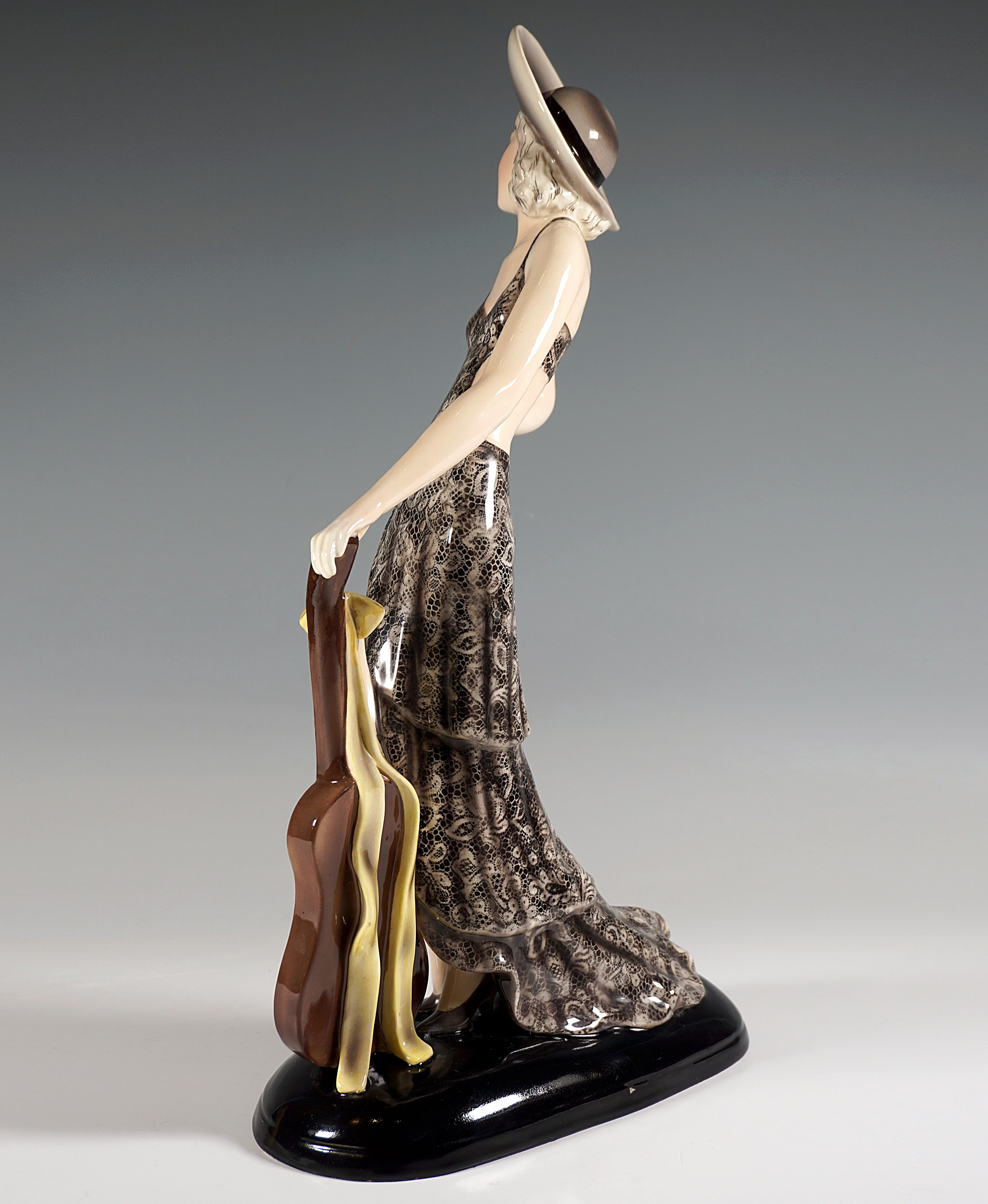 Austrian Goldscheider Figure Lady With Hat And Guitar by Stephan Dakon, Vienna ca. 1934 For Sale