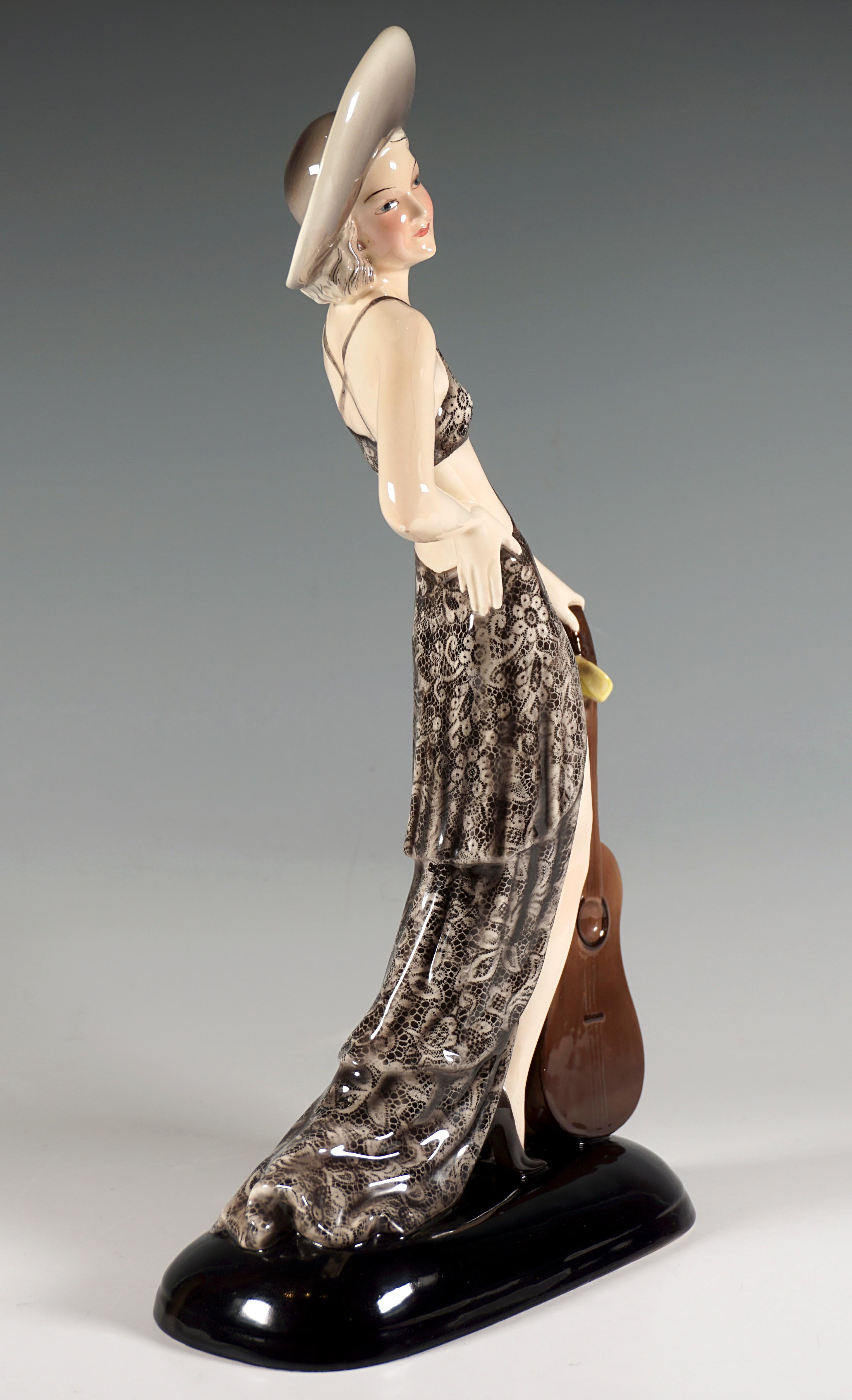Hand-Painted Goldscheider Figure Lady With Hat And Guitar by Stephan Dakon, Vienna ca. 1934 For Sale