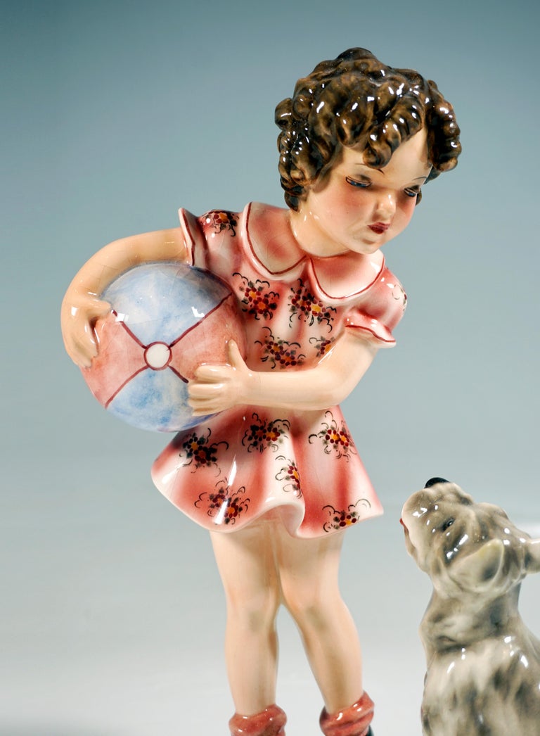 Hand-Crafted Goldscheider Figurine, Girl with Ball and Terrier by Germaine Bouret, 1937