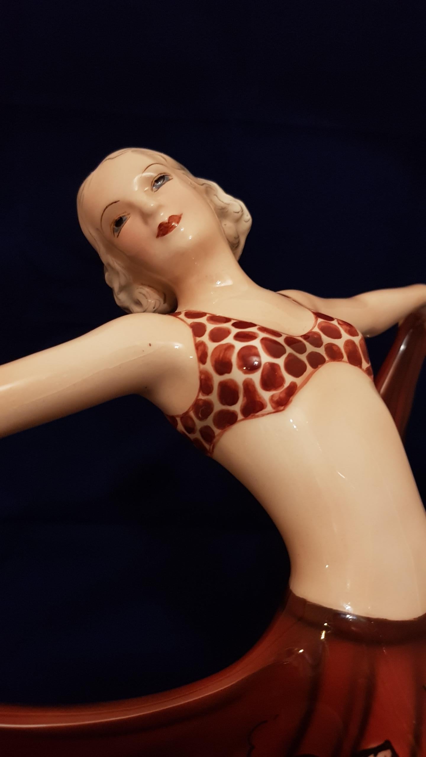 Goldscheider 1936 Lorenzl Josef: ceramic dancer with a bikini separated from the butterfly skirt with floral pattern.
Marked under the base and numbered 758220210, H 36 cm approximately
Published: Robert E. Dechant / Filipp Goldscheider