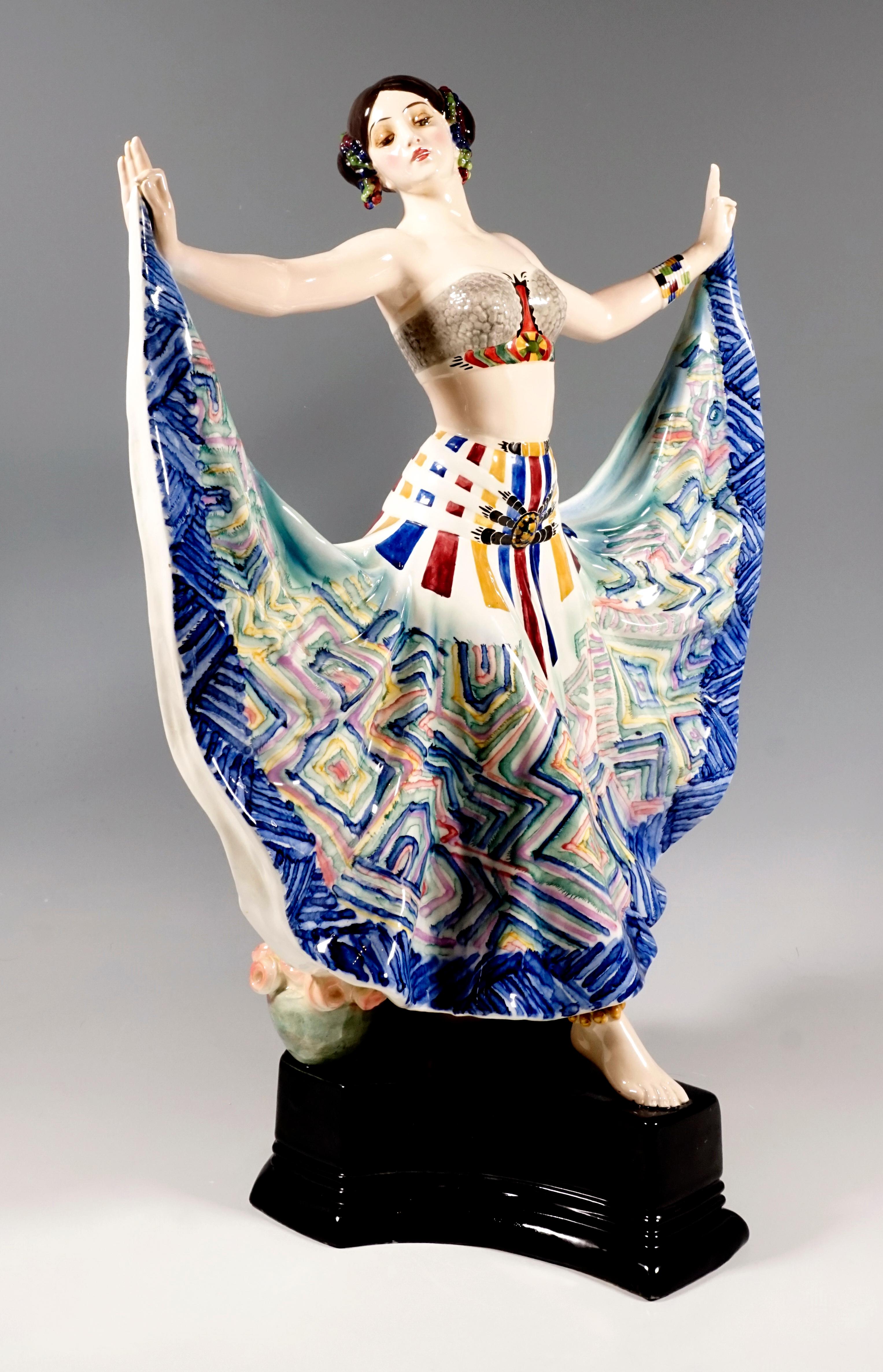 Very wanted Art Deco Goldscheider ceramic figure of the 1920s.
Depiction of the dancer Ruth Saint Denis (1877/79 - 1968, actually Ruth Dennis, 'Miss Ruth') during her dance 'Radha'- Dance of the Five Senses, first performed in 1906.
The dancer