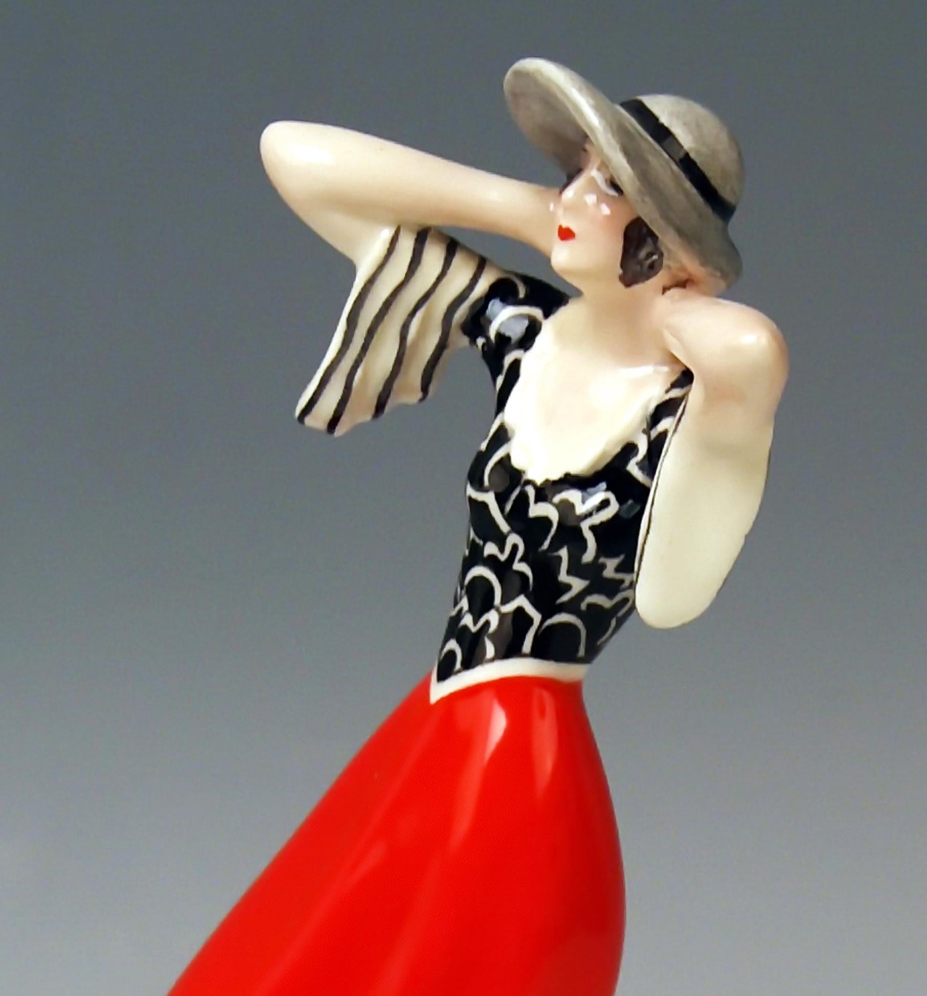 Goldscheider Vienna walking lady wearing hat: This figurine is called 