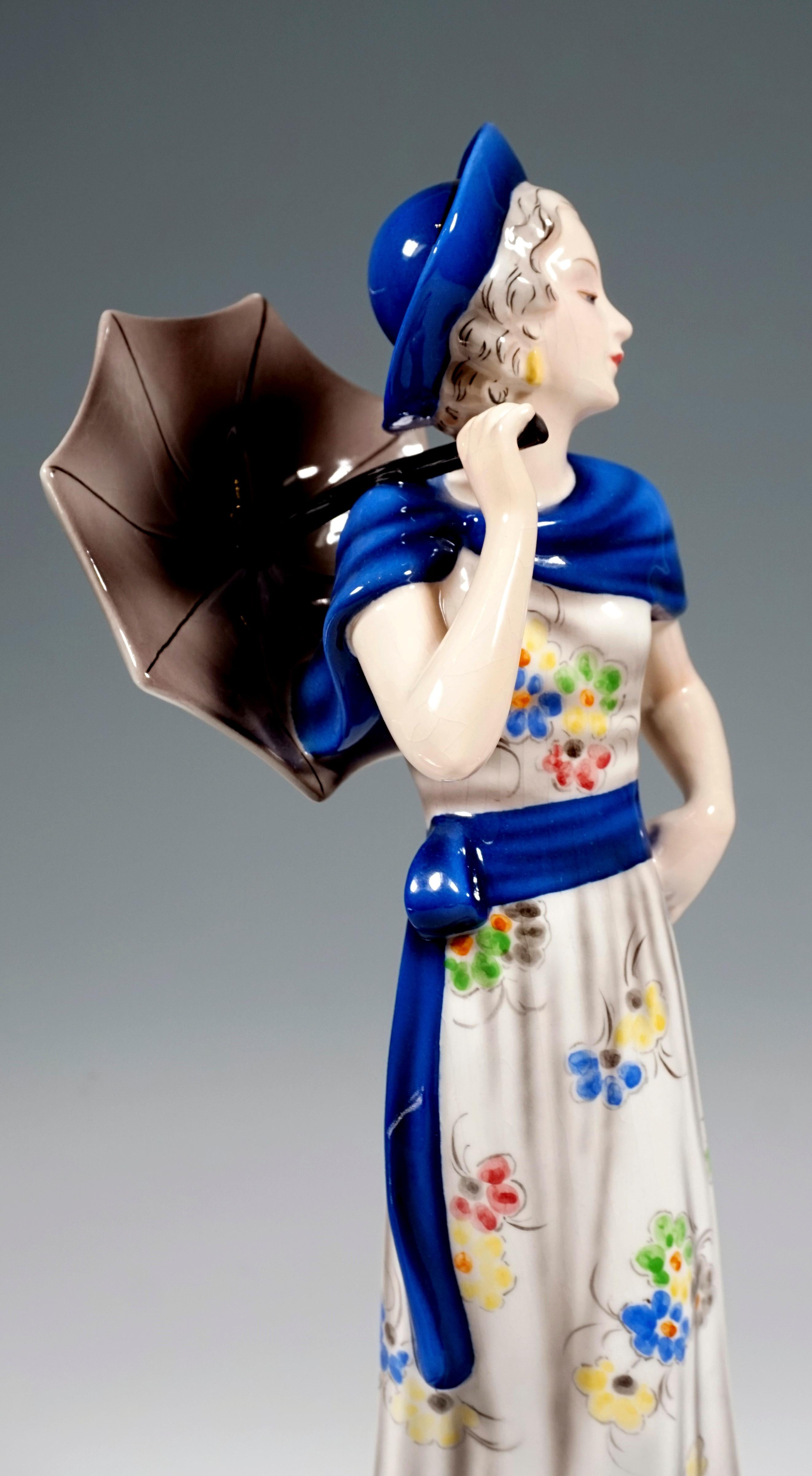 Hand-Painted Goldscheider Vienna Figure Lady with Hat and Parasol, by Josef Lorenzl, ca 1936 For Sale