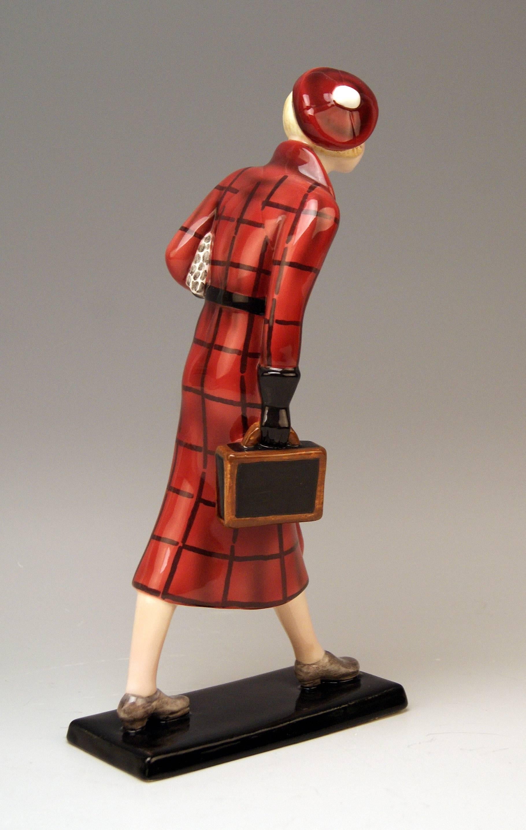 Goldscheider Vienna rarest lady figurine: The traveller with small suitcase.

Possibly designed by Josef Lorenzl (1892-1950) or Stefan (= Stephen) Dakon (1904–1997).
Lorenzl was one of the most important designers having been active for