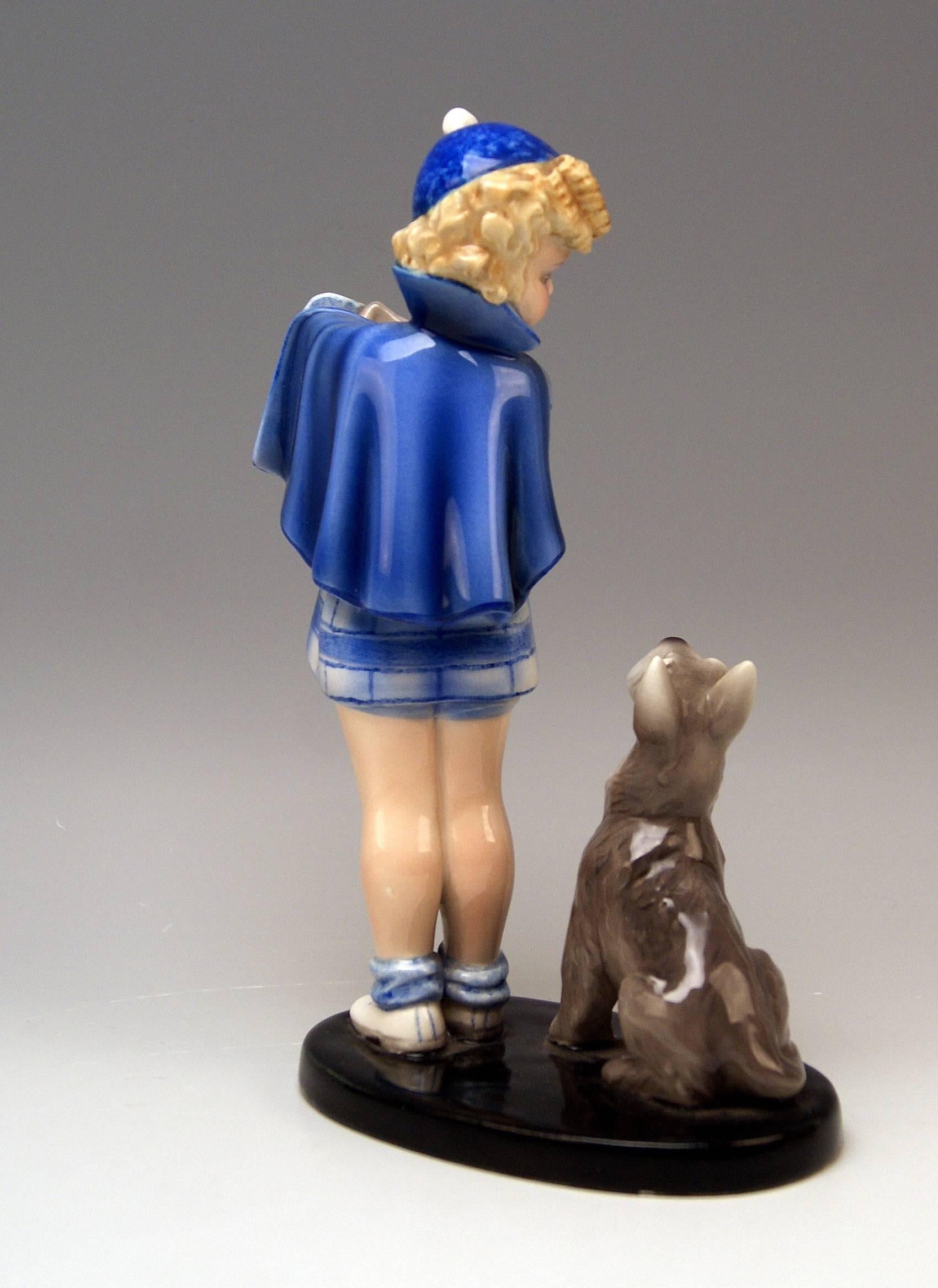 Goldscheider Vienna stunning girl figurine:
Girl figurine accompanied by Scottish Terrier - This Figurine Group is Called: Come With Me!

This model was once created by Germaine BOURET (1907- 1953).
Bouret was a French illustrator, having become