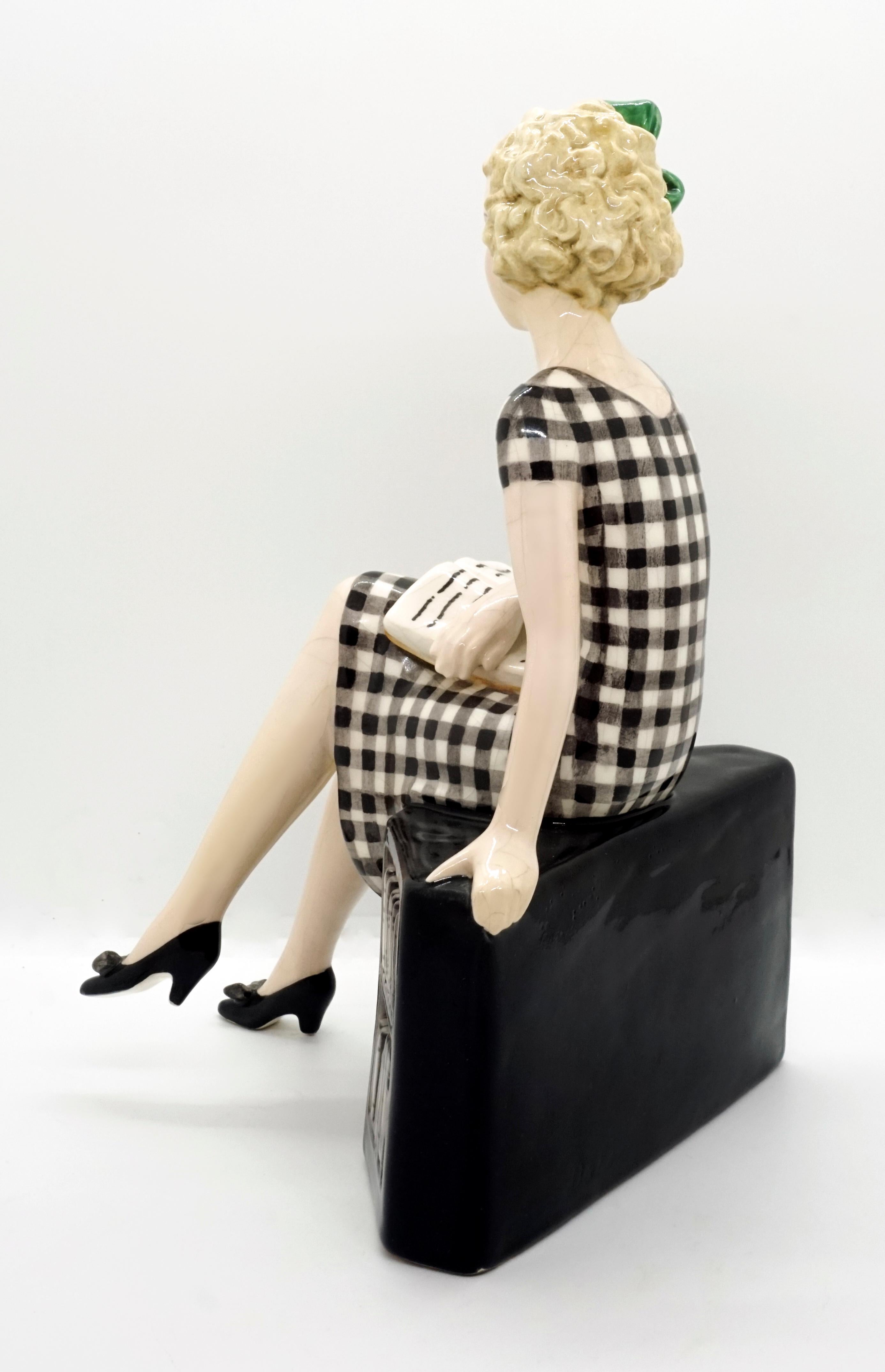 Art Deco Goldscheider Vienna Girl with Book Sitting on a Bookshelf by Dakon, circa 1935