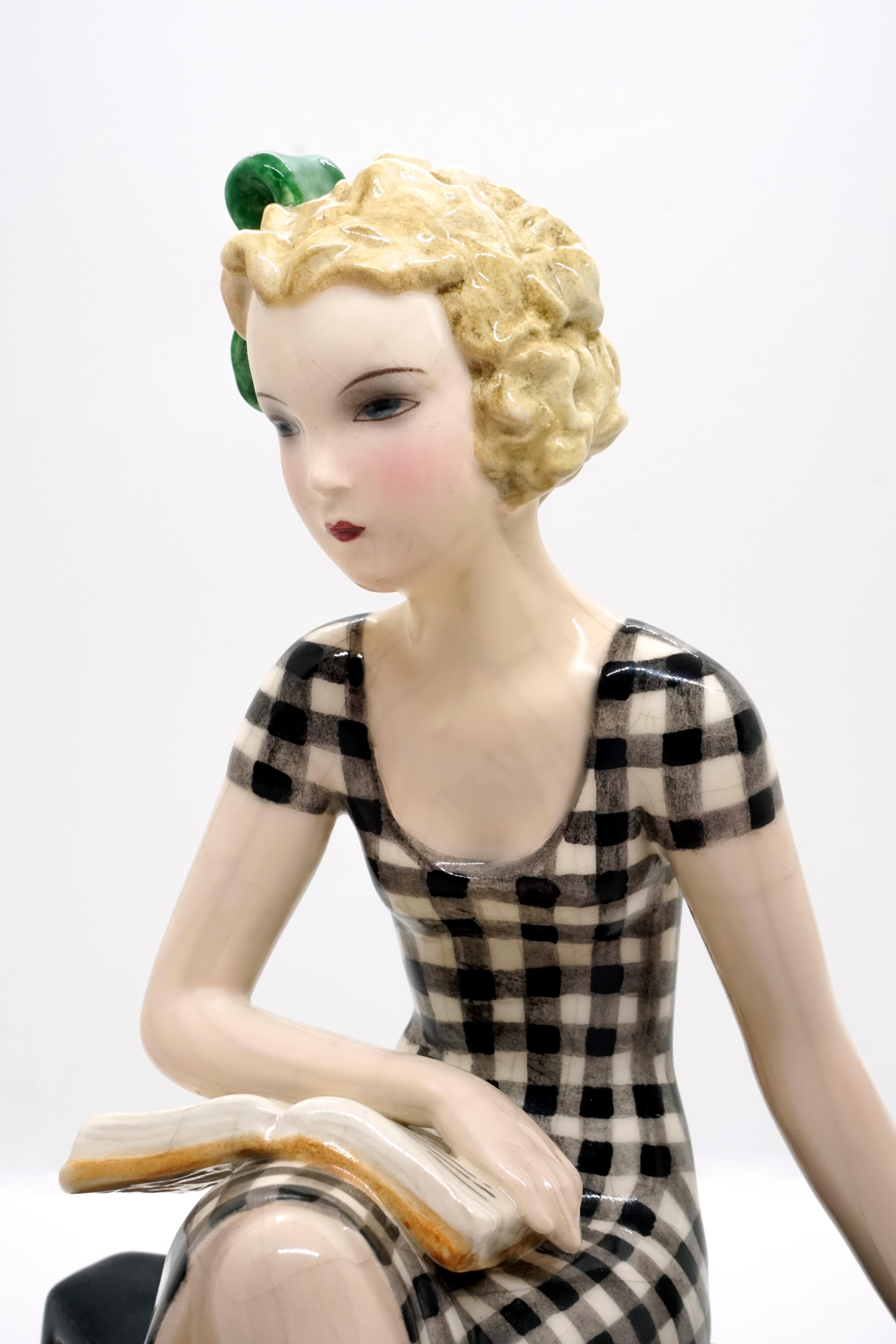 Ceramic Goldscheider Vienna Girl with Book Sitting on a Bookshelf by Dakon, circa 1935