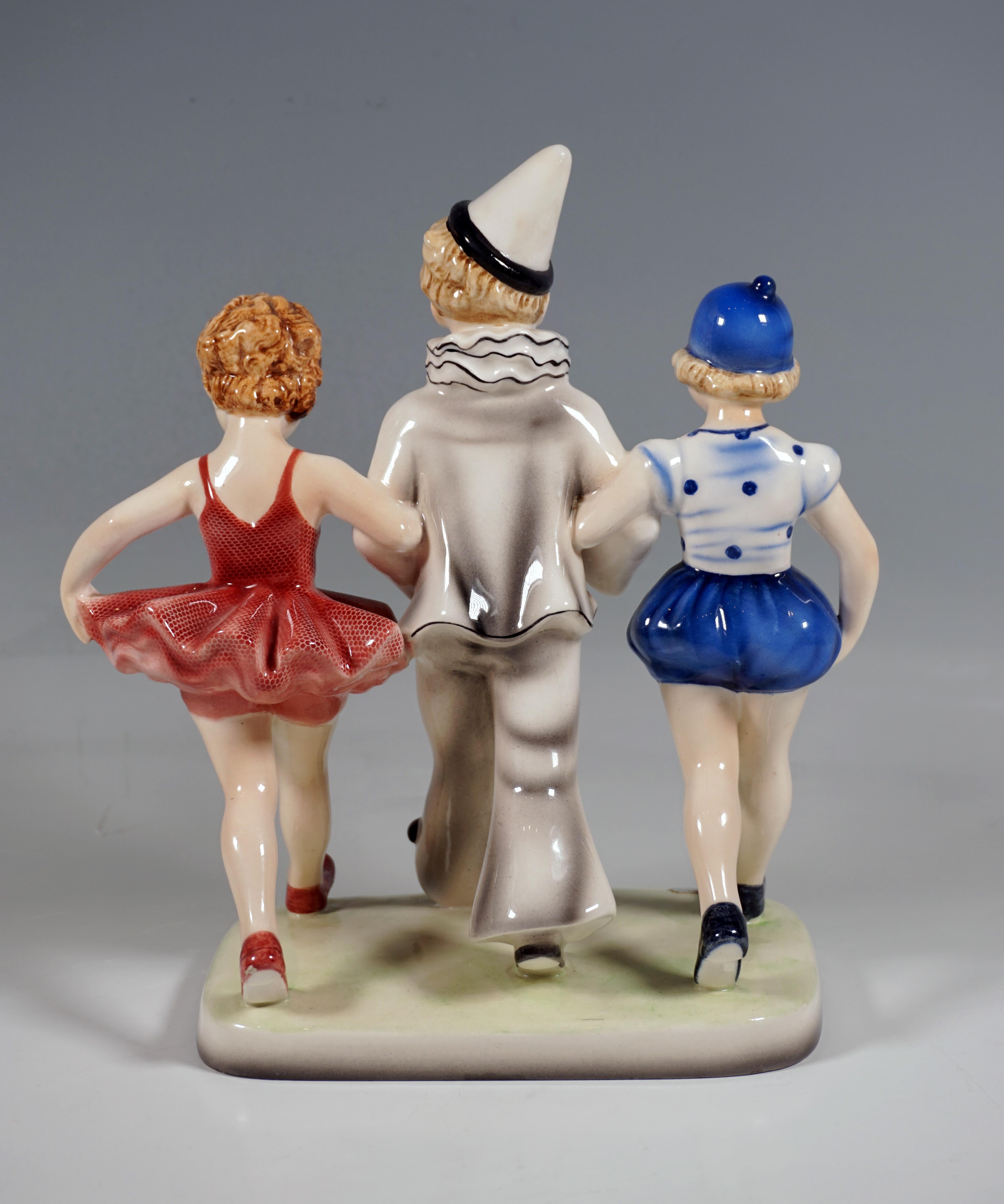 Art Deco  Goldscheider Vienna Group, 'Pierrots' Three Children Walking, by Dakon, ca 1938 For Sale