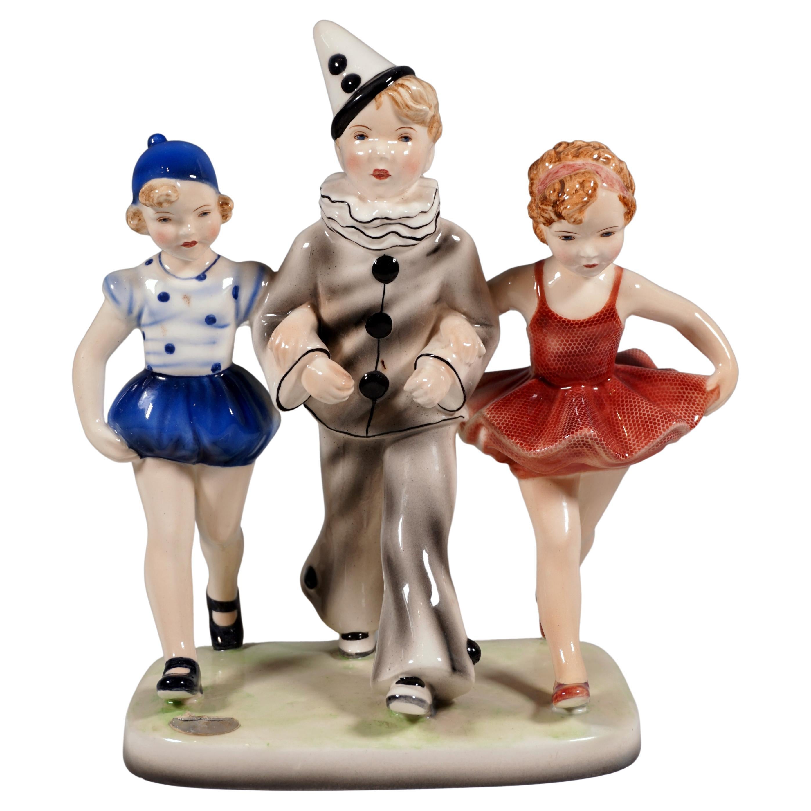  Goldscheider Vienna Group, 'Pierrots' Three Children Walking, by Dakon, ca 1938 For Sale