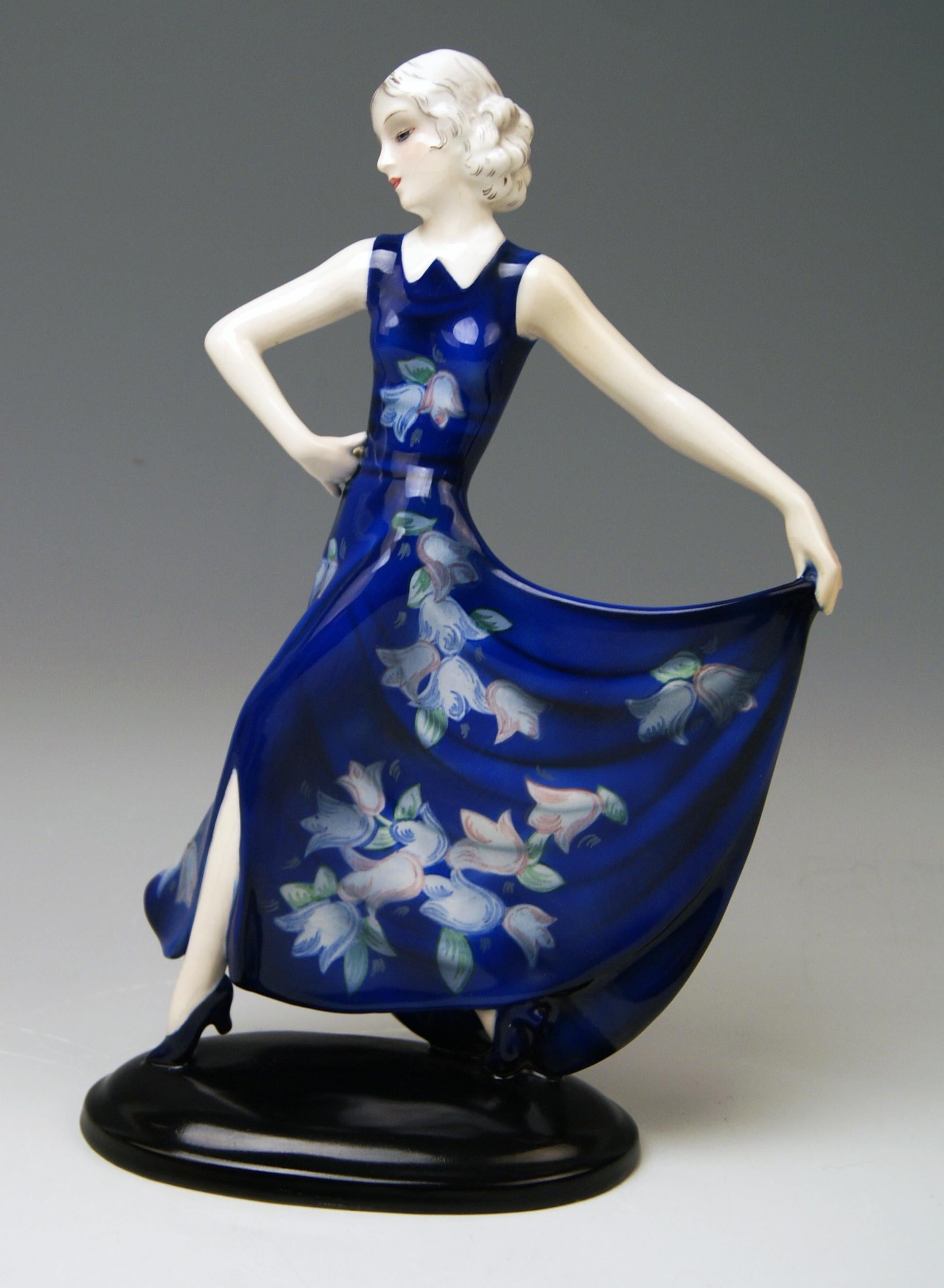 Goldscheider Vienna excellent lady dancer clad in cobalt blue dress.

Designed by Josef Lorenzl (1892-1950) / one of most important designers having been active for Goldscheider manufactory in period of 1920-1940 / designed, circa 1936.

Made