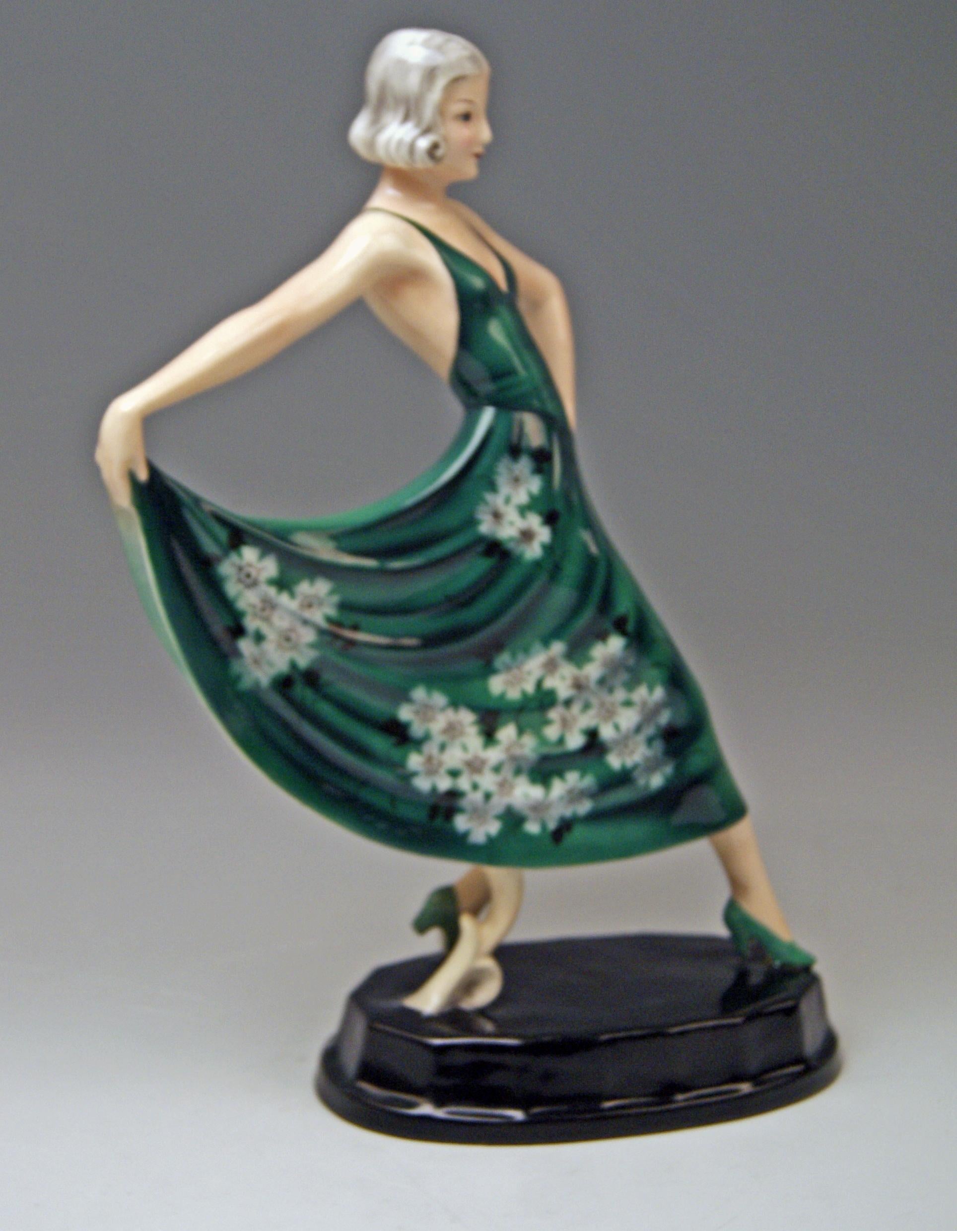 Goldscheider Vienna lady dancer.

Designed circa 1935-1936 by Stephan Dakon (1904-1997).
made circa 1936-1937
model number 6754 / 60 / 19
painter's and modeller's signs & signature 'Dakon' at reverse side of base existing / additionally, the