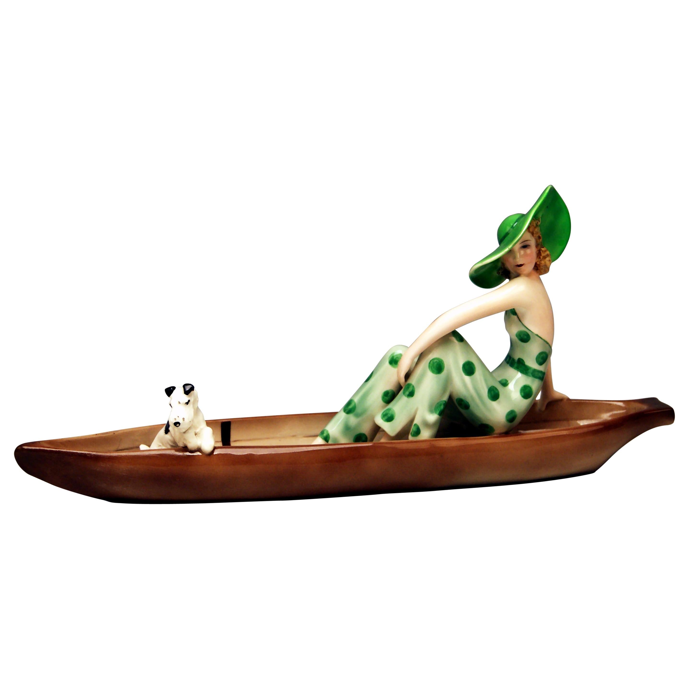 Goldscheider Vienna Lady with Fox Terrier in Canoe Model 7256 Dakon, circa 1936