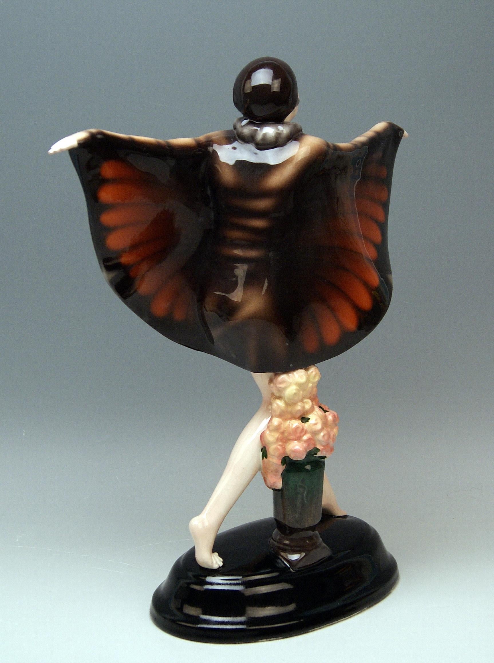 Goldscheider Vienna gorgeous dancingy lady figurine: the captured bird turning towards left side.

Designed by Josef Lorenzl (1892-1950) / one of the most important designers having been active for Goldscheider manufactory in period of 1920-1940 /