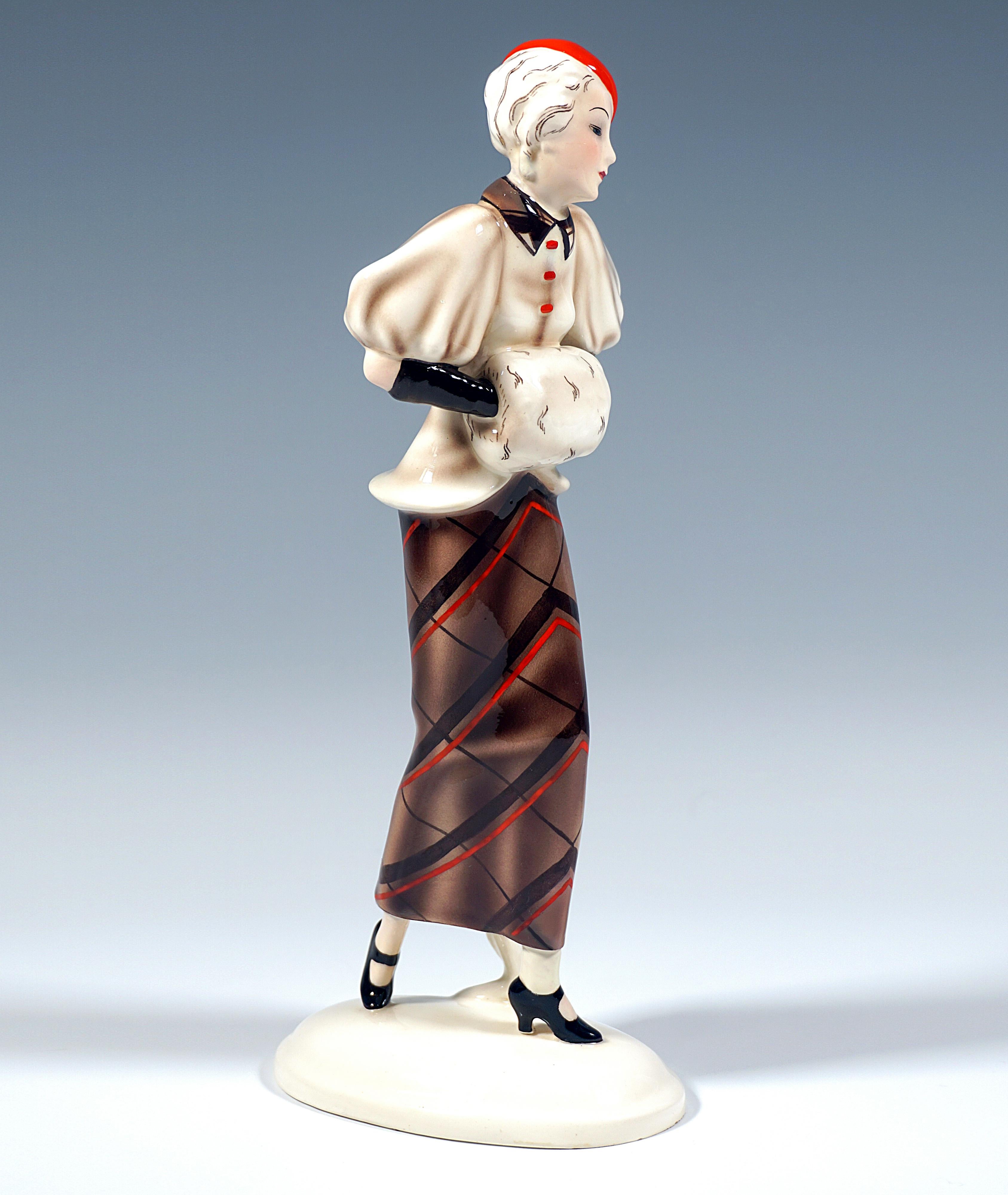 Art Deco Goldscheider Vienna Striding Lady With Cape And Muff, by Josef Lorenzl, ca 1934 For Sale